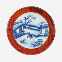 A Chinese blue and white porcelain-inset hardwood revolving small stand 20th Century