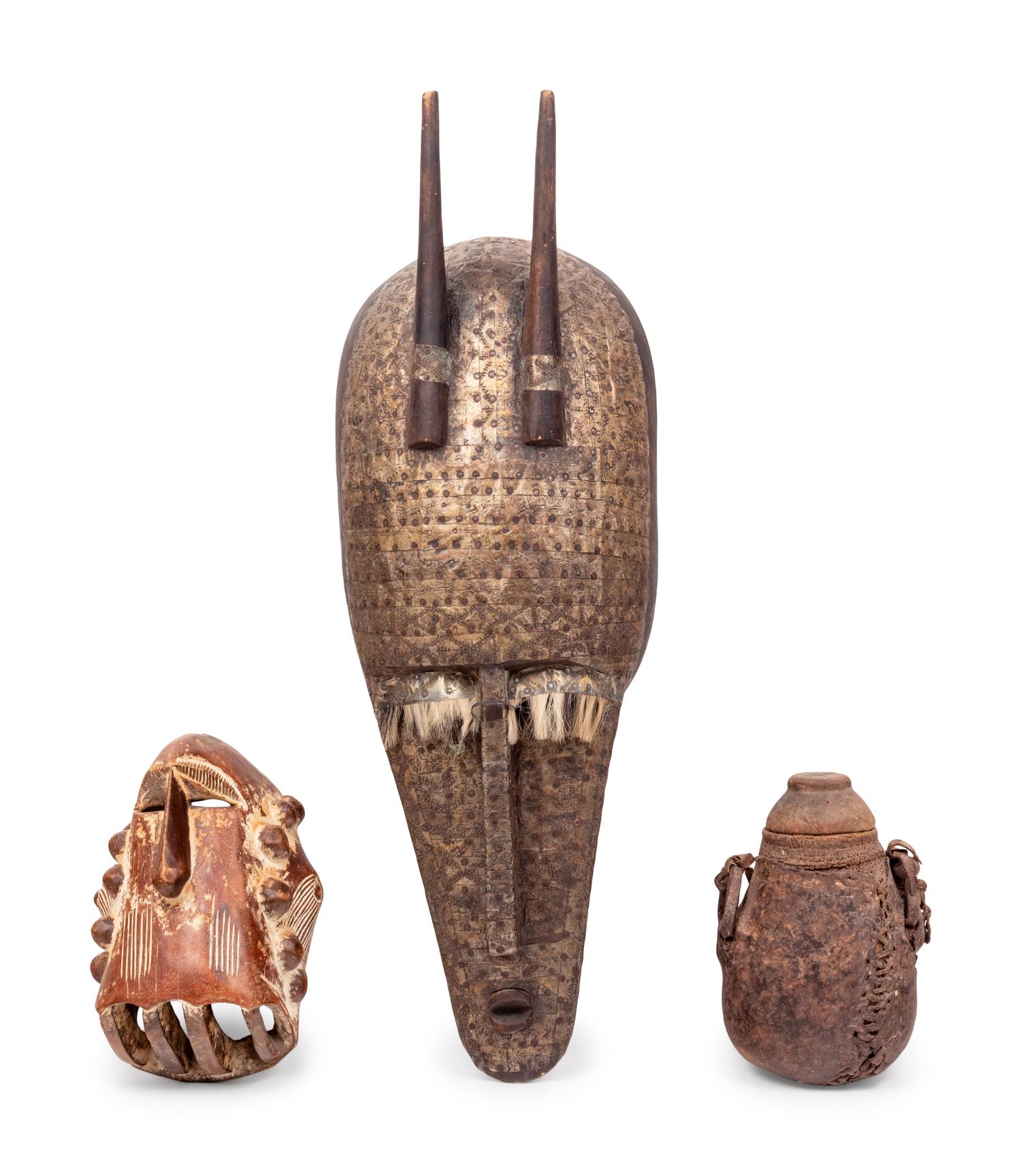 Two African Carved Wood Masks and a Covered Vessel