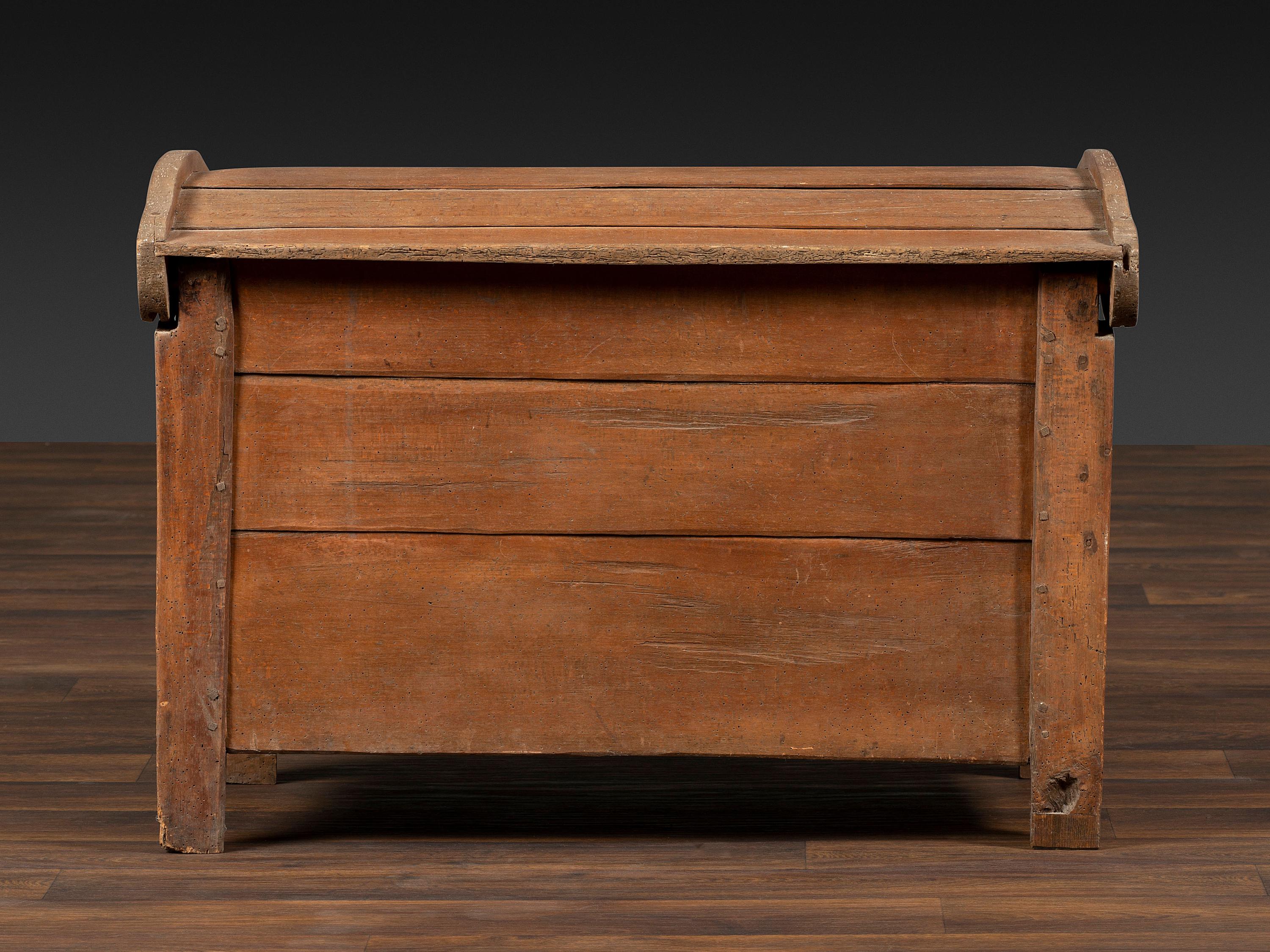 A Continental Chip and Bird Carved Dome-Top Blanket Chest