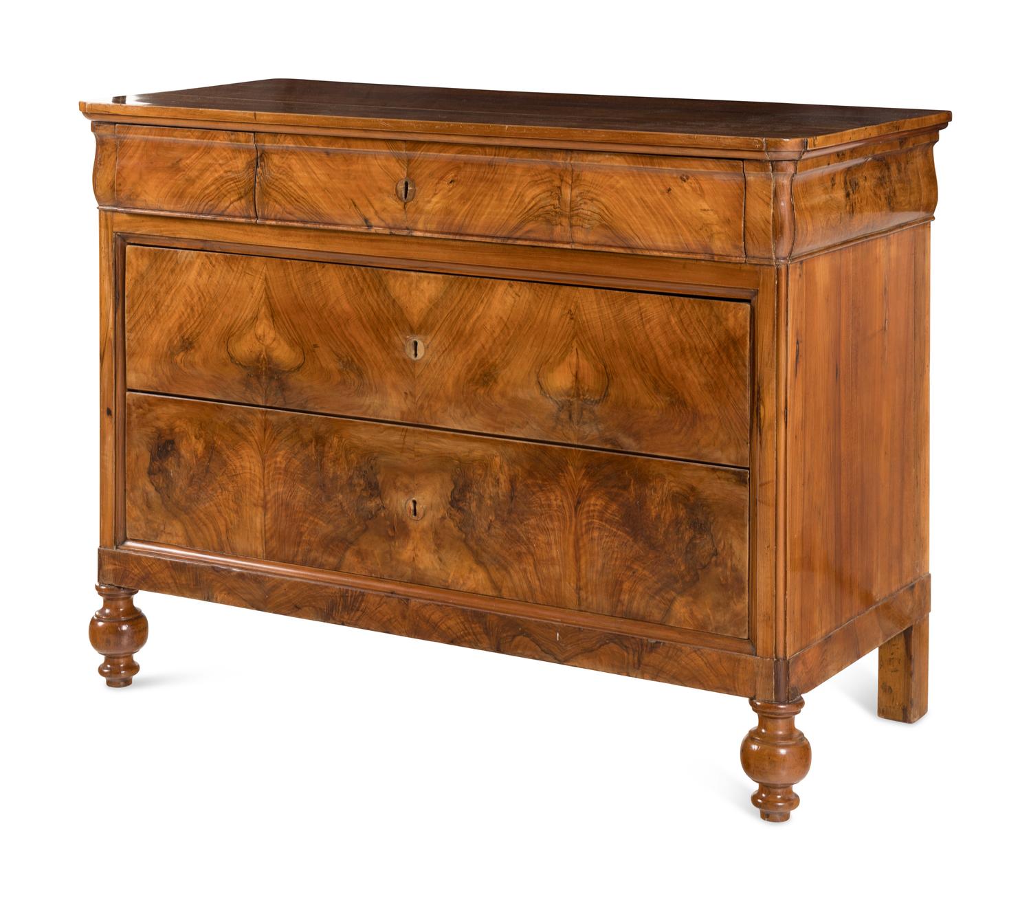 An Italian Walnut Chest of Drawers