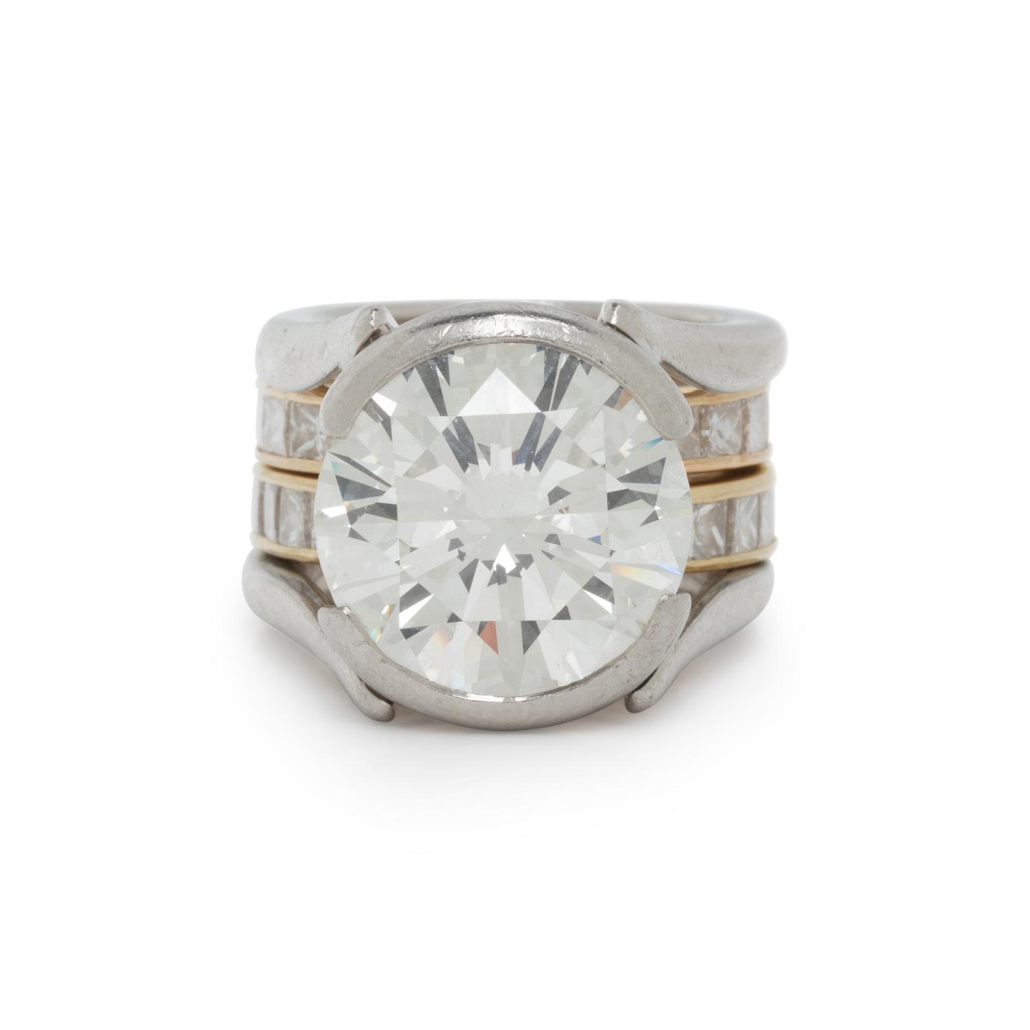 DIAMOND AND PLATINUM RING WITH PAIR OF ETERNITY BANDS
