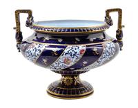 A Sarreguemines Ceramic Urn Height 11 3/4 x width over handles 14 3/4 inches.