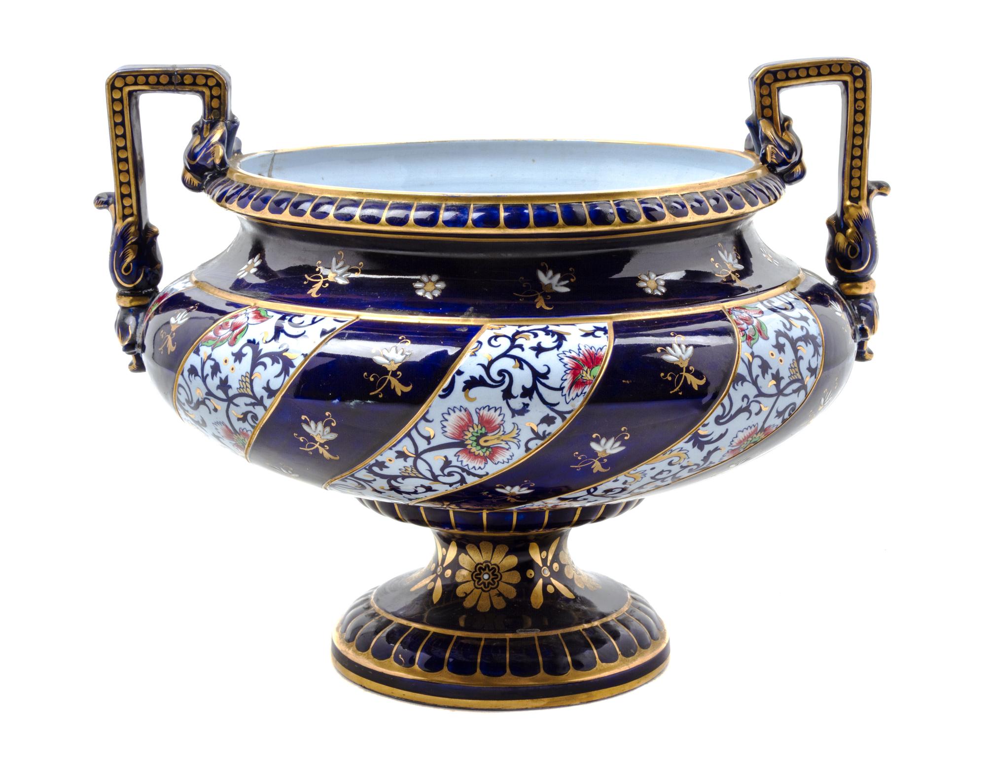 A Sarreguemines Ceramic Urn Height 11 3/4 x width over handles 14 3/4 inches.