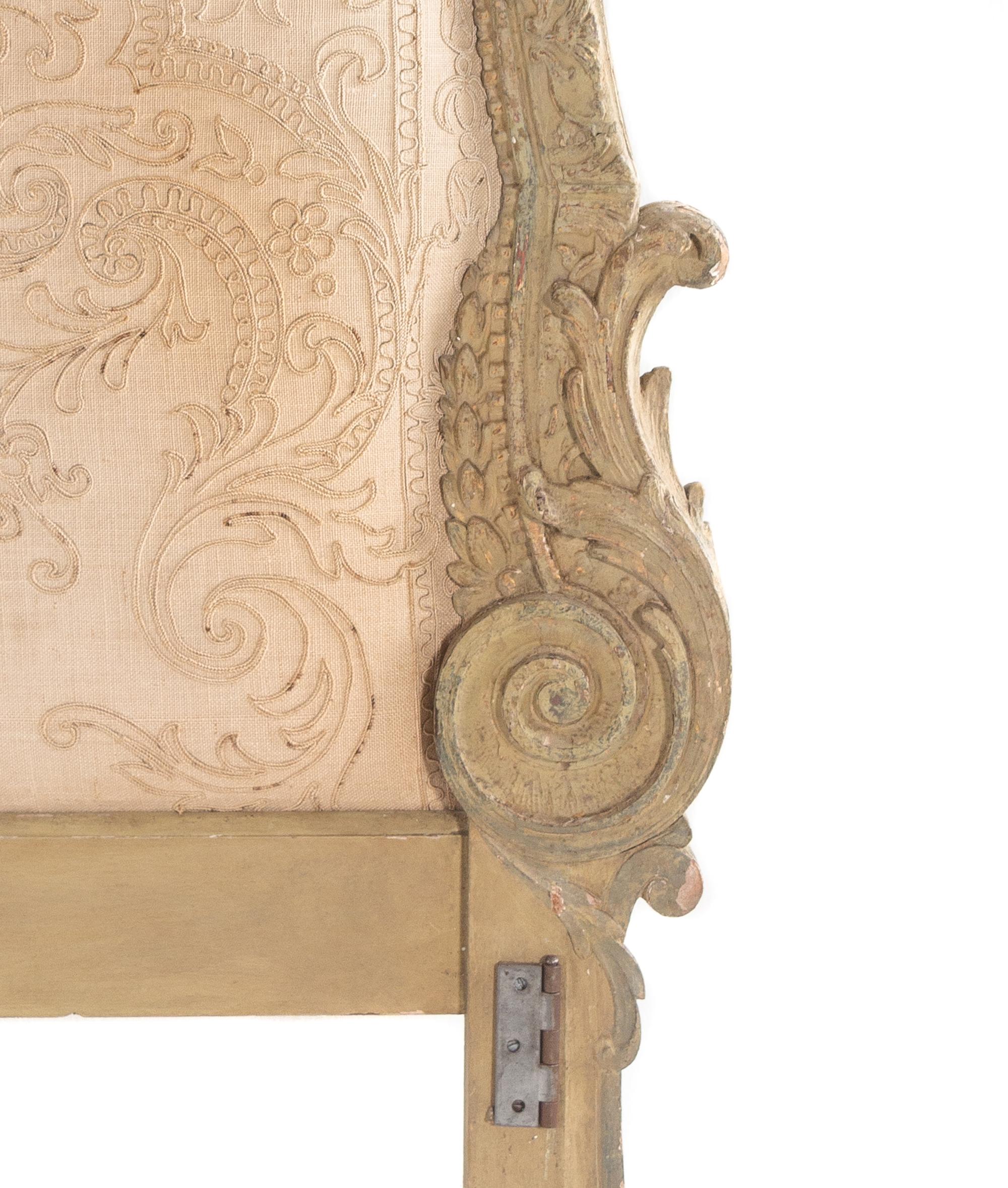 An Italian Cream-Painted, Carved and Upholstered Headboard