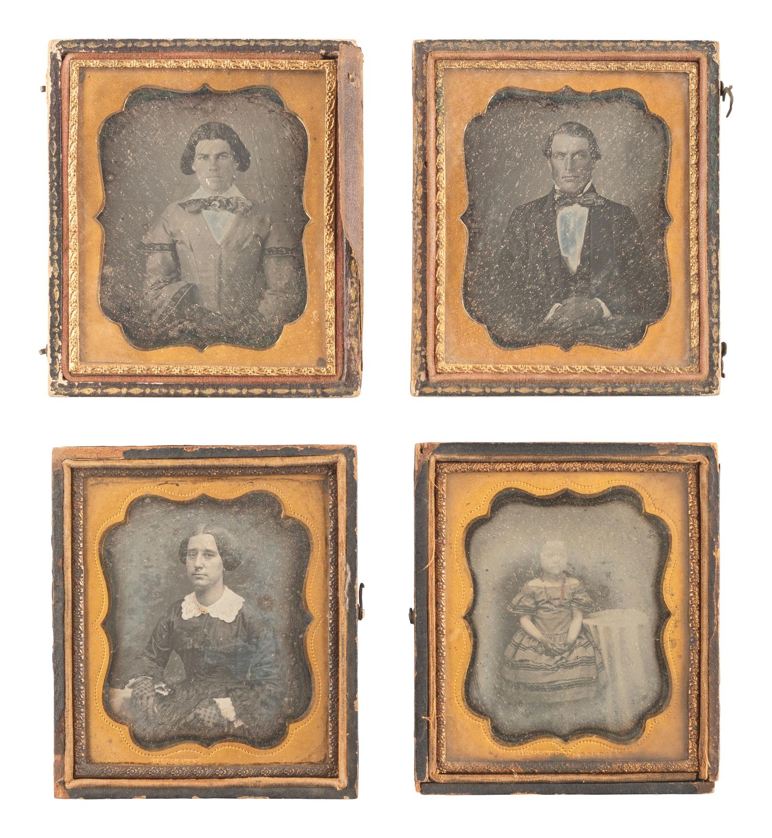 [EARLY PHOTOGRAPHY]. 28 daguerreotypes housed in pairs within side-by-side cases.