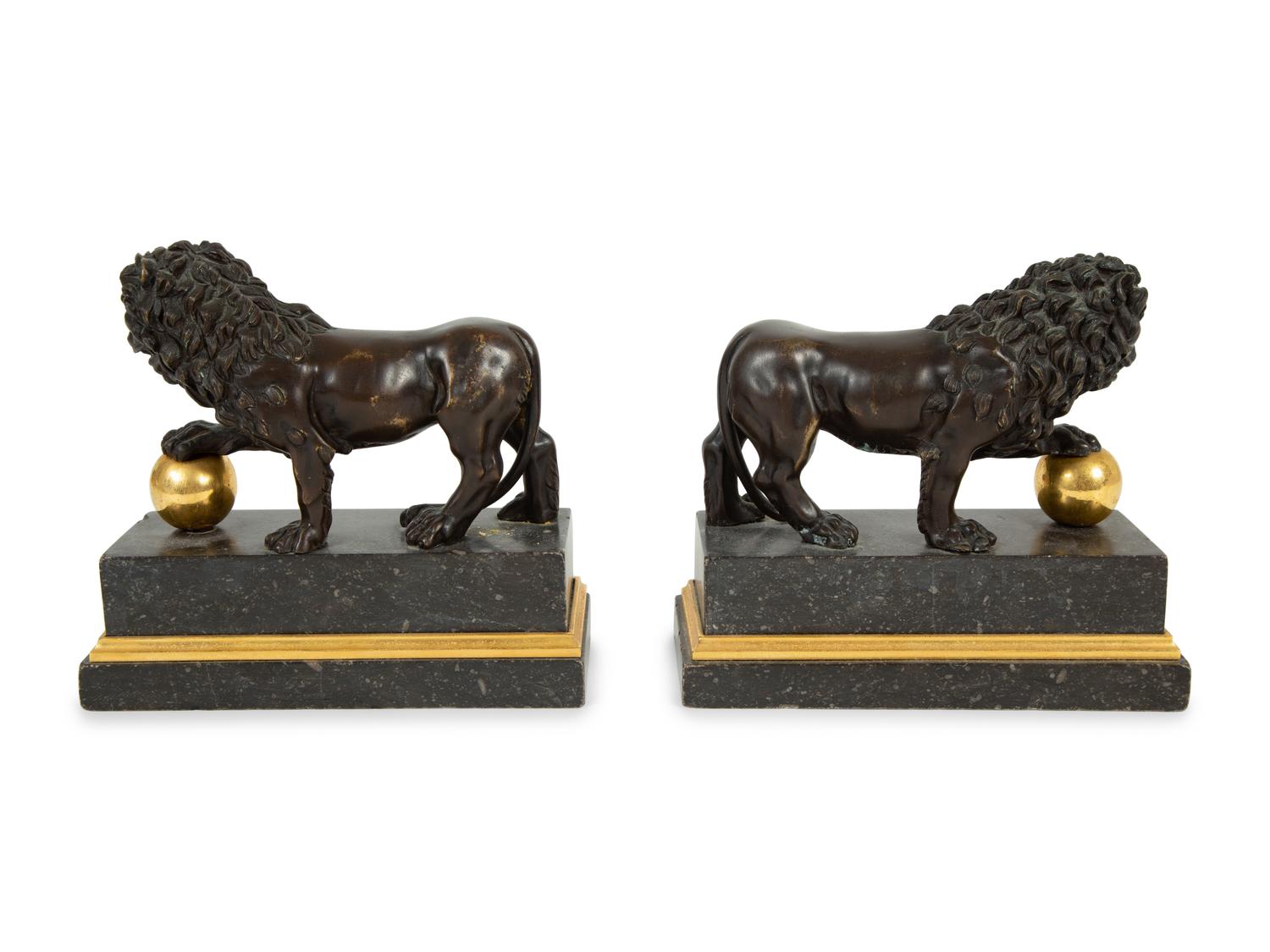 A Pair of Continental Patinated and Gilt Bronze Medici Lions
