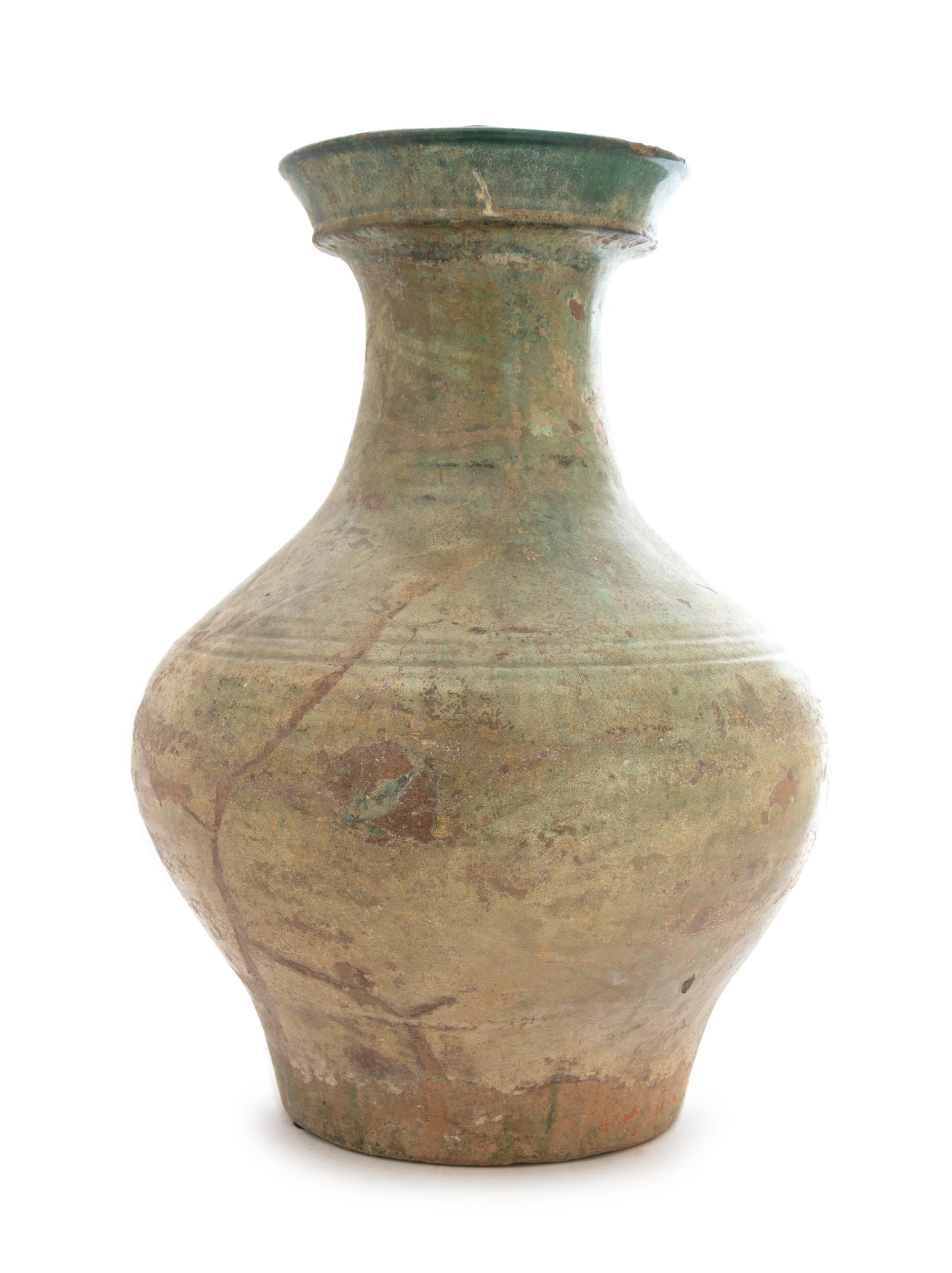 A Chinese Green Glazed Pottery Hu Height 15 inches. — HAN DYNASTY (206 B.C. - A.D. 220)