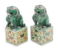 A Pair of Famille Verte Porcelain Figures of Fu Lions