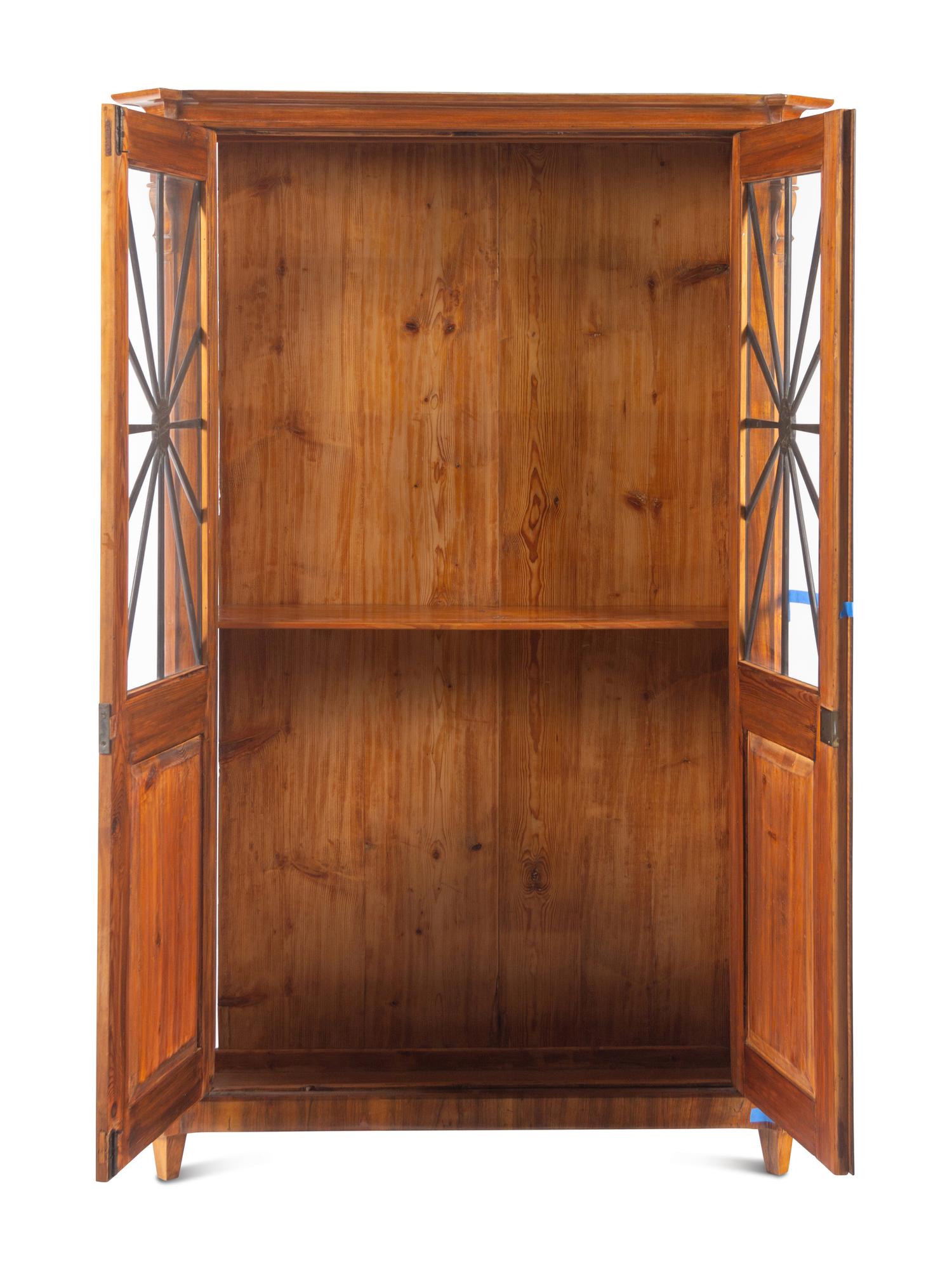 A Biedermeier Part-Ebonized Figured Walnut Bookcase