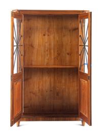 A Biedermeier Part-Ebonized Figured Walnut Bookcase