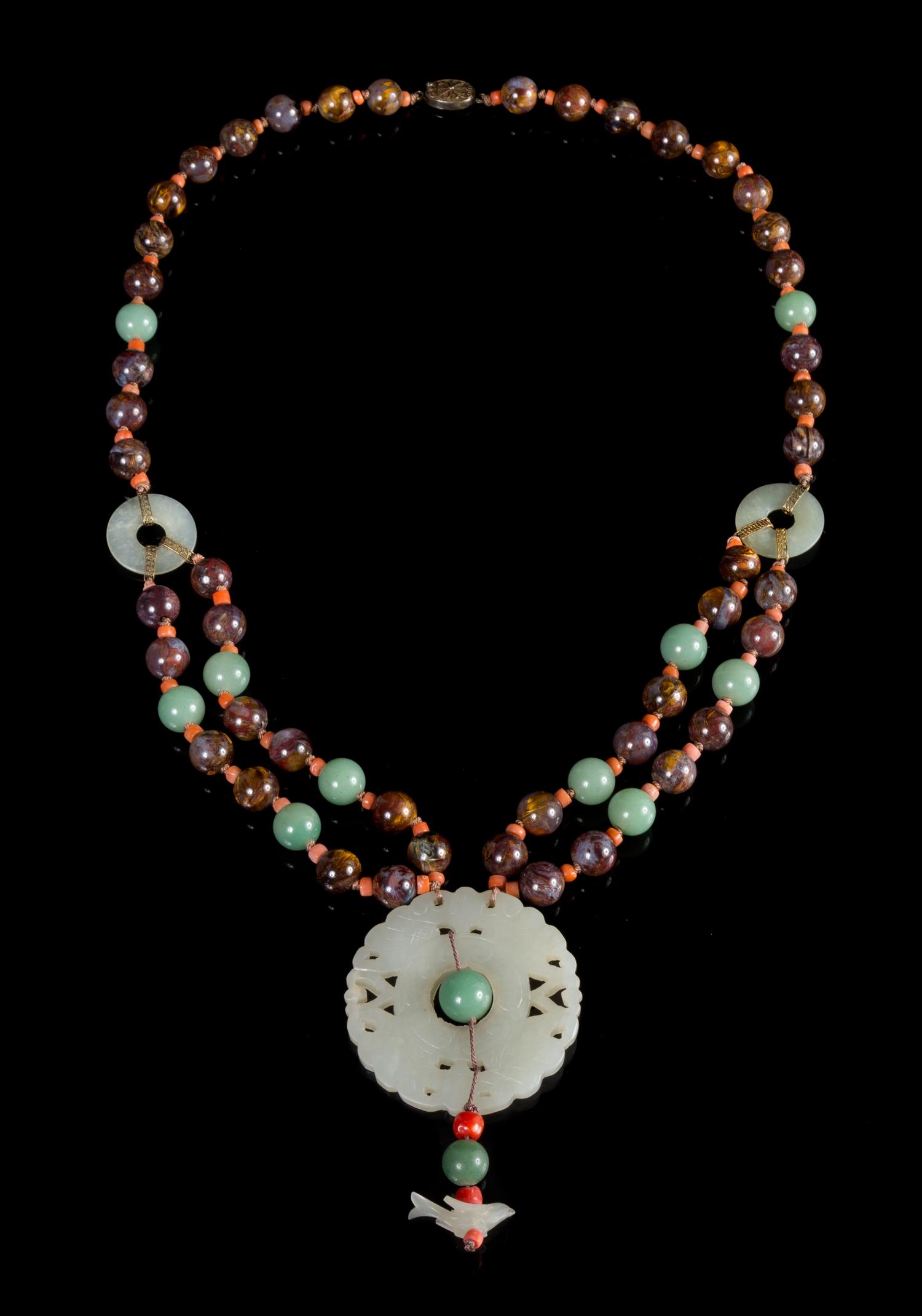 A Celadon Jade, Jadeite and Hardstone Beaded Necklace Length 18 1/4 inches.