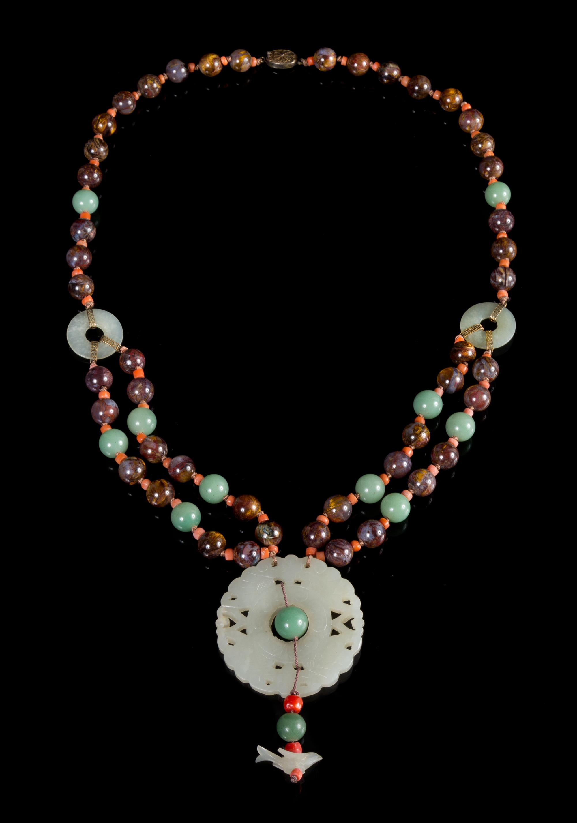 A Celadon Jade, Jadeite and Hardstone Beaded Necklace Length 18 1/4 inches.