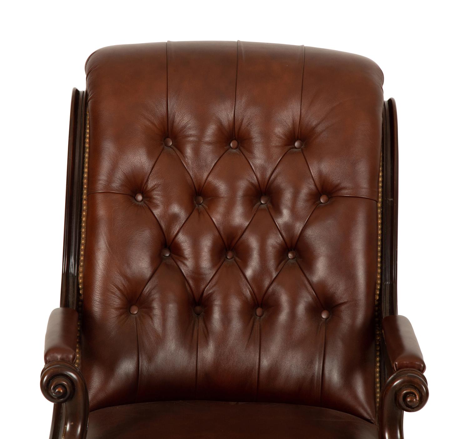A Regency Style Leather Upholstered Mahogany Open Armchair — 20th Century
