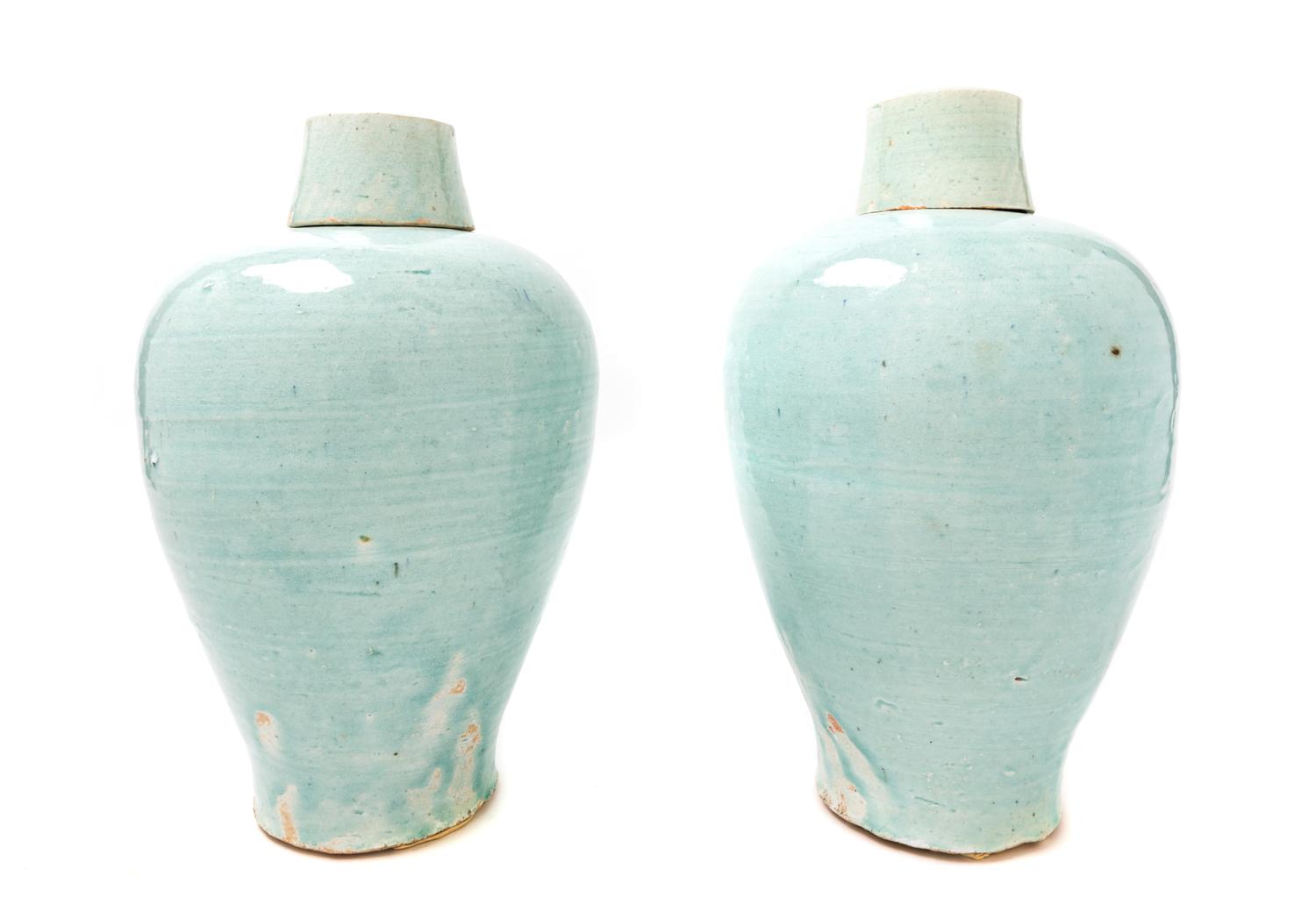 Two Qingbai Glazed Porcelain Covered Vases Height 14 inches. — YUAN DYNASTY (1279-1368 C.E.)
