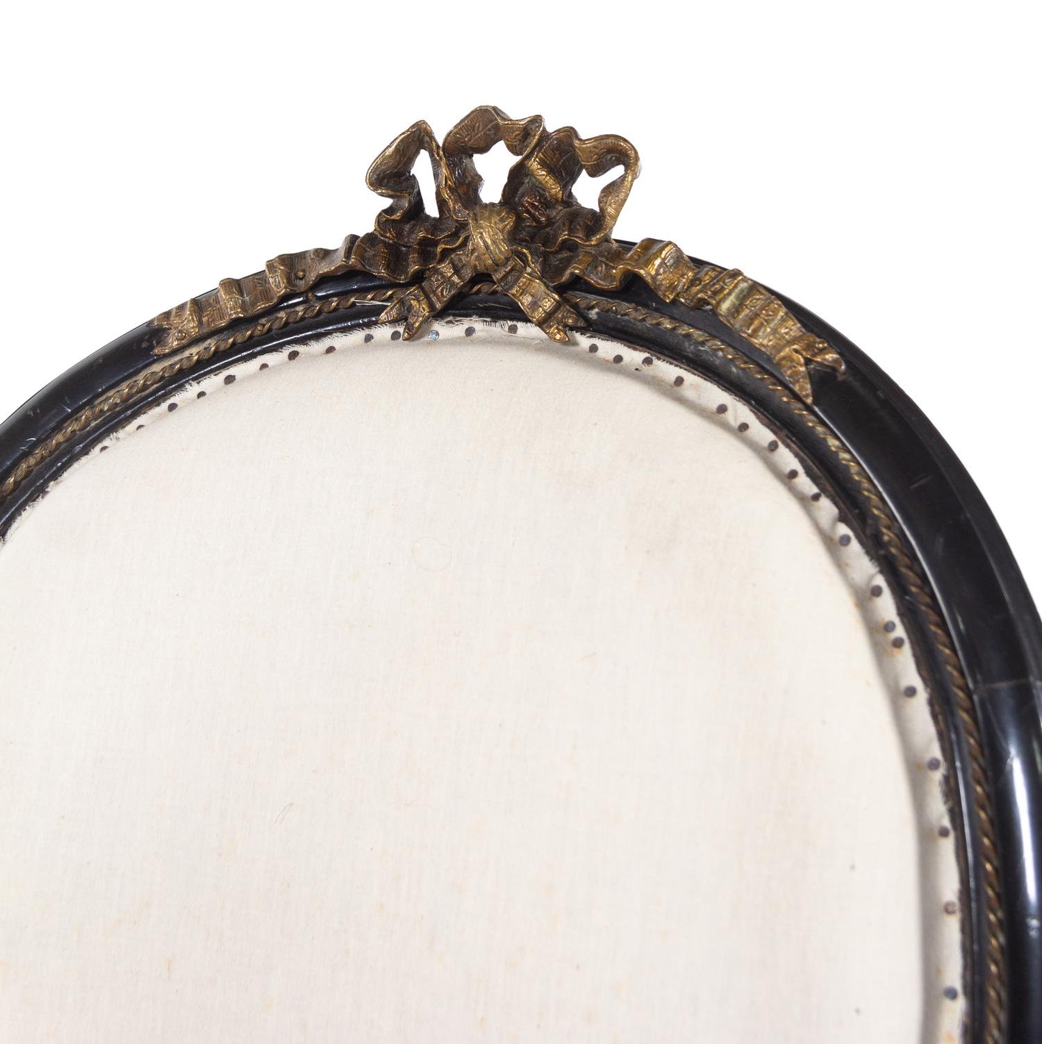 A Pair of Napoleon III Gilt Metal Mounted Ebonized Fauteuils