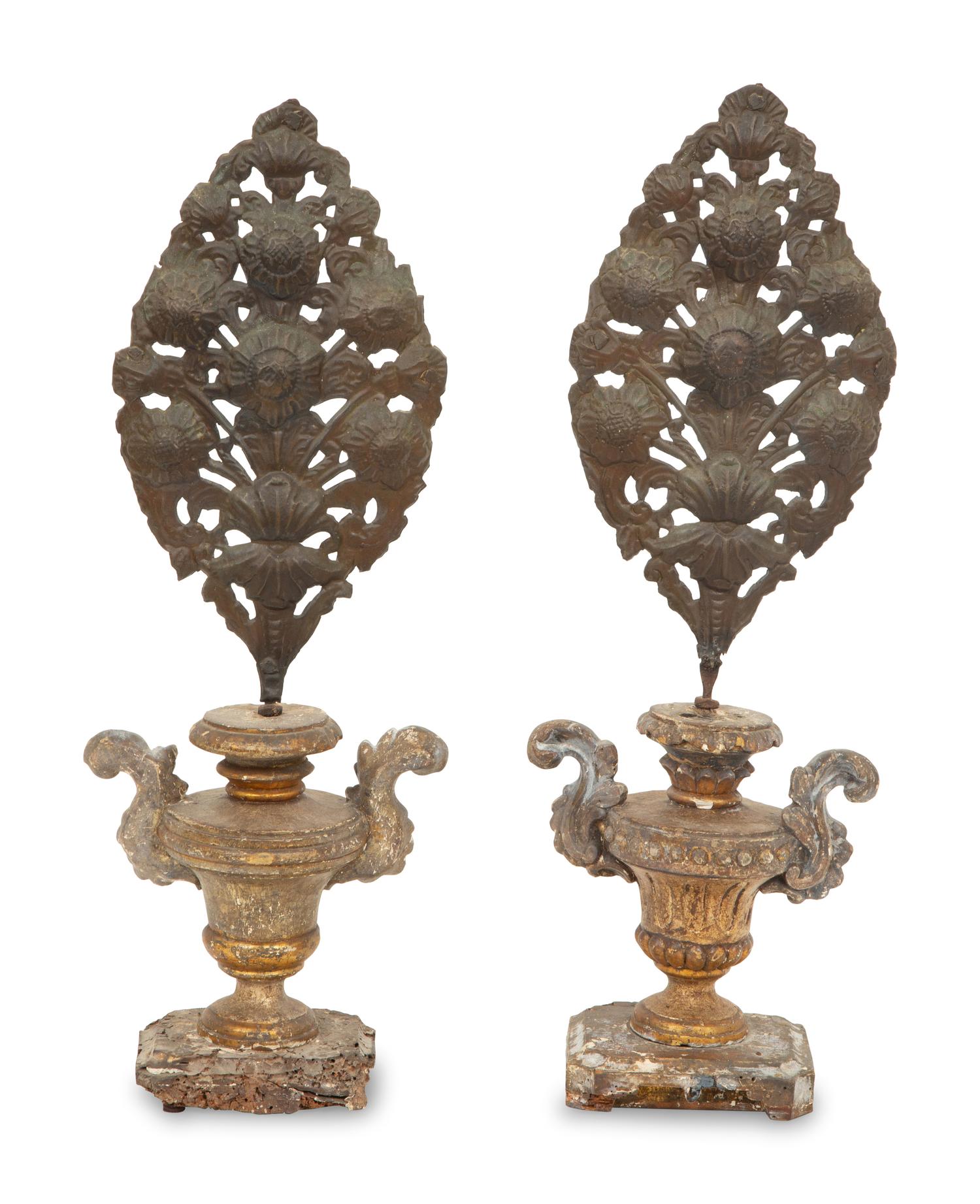 A Pair of Italian Carved Giltwood Urns Inset with Tole Floral Sprays