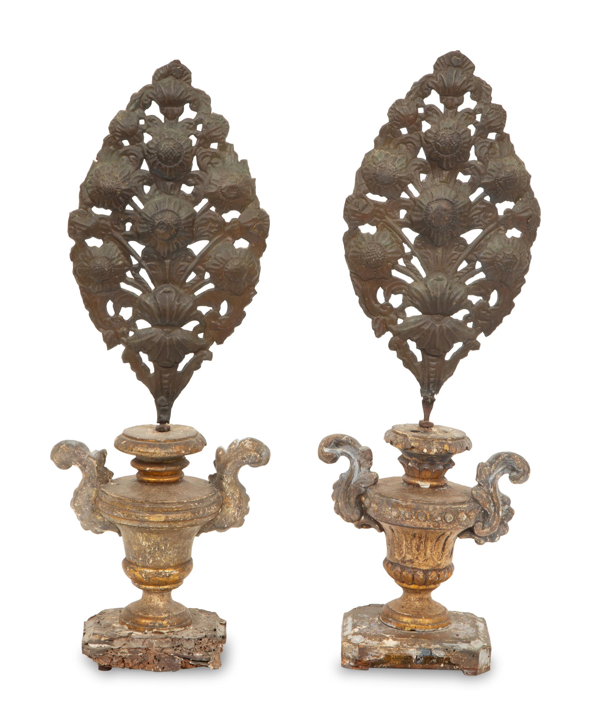 A Pair of Italian Carved Giltwood Urns Inset with Tole Floral Sprays
