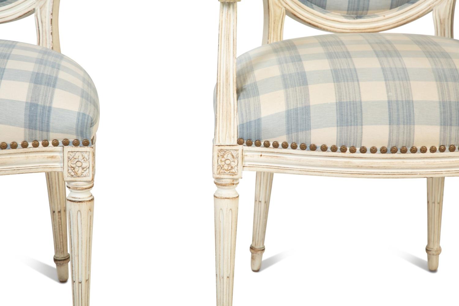 A Set of Ten Louis XVI Style Painted Dining Chairs — 20TH CENTURY