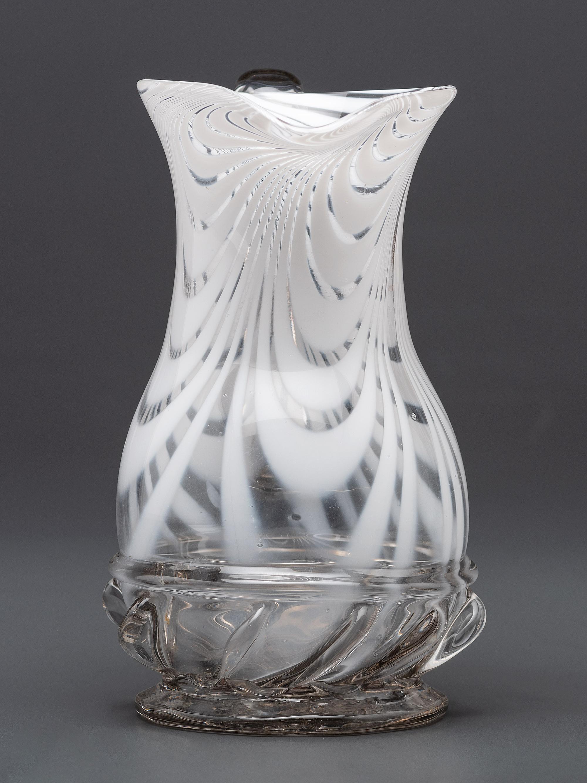 A New Jersey Blown-Glass Pitcher in Clear with White Swirls