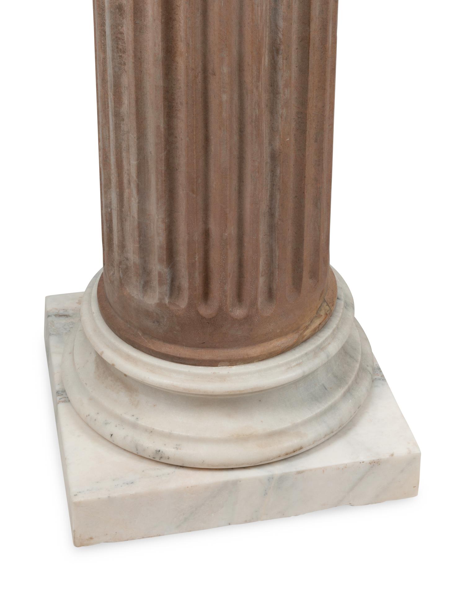 A Pair of Continental Fluted Marble Pedestals