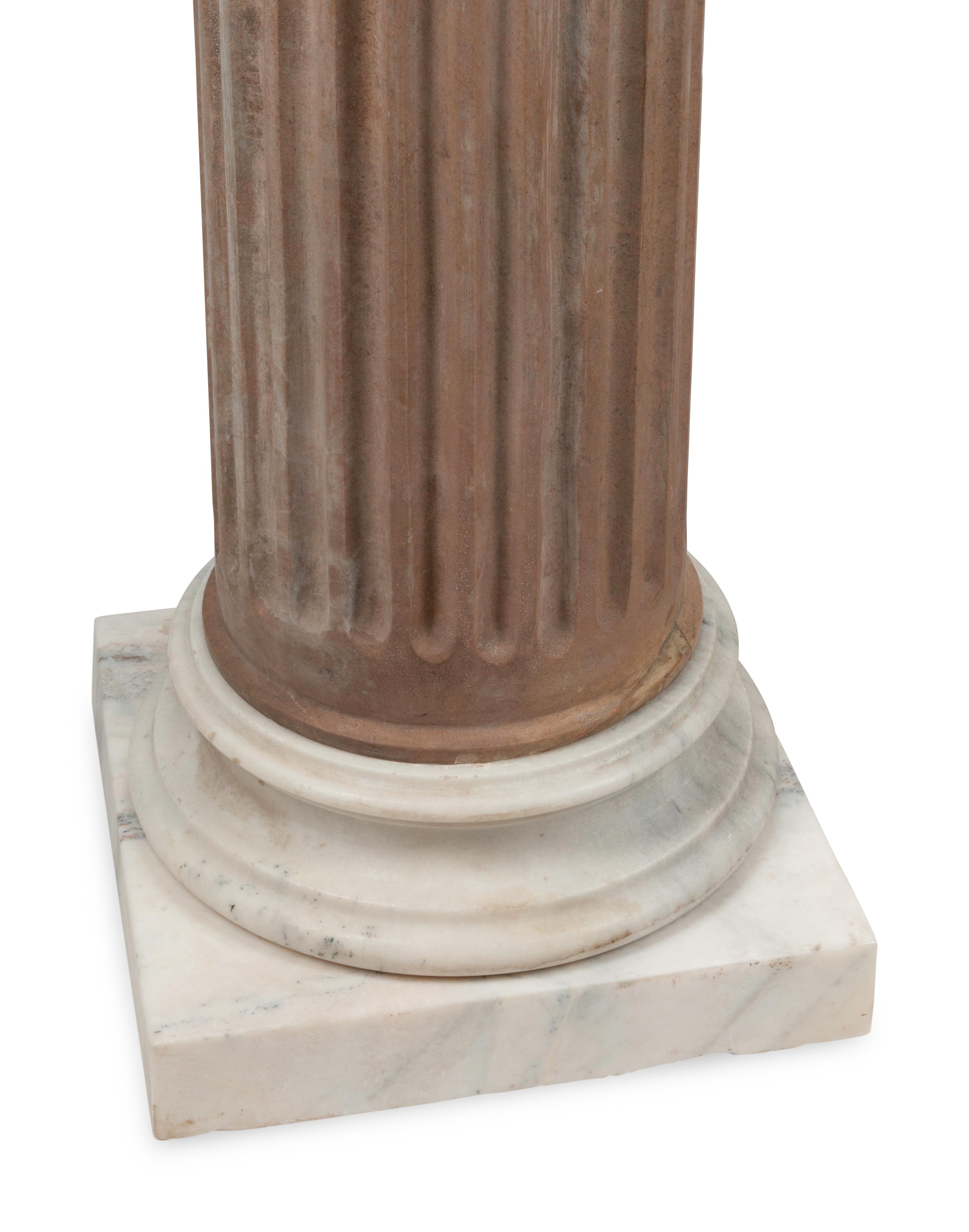 A Pair of Continental Fluted Marble Pedestals
