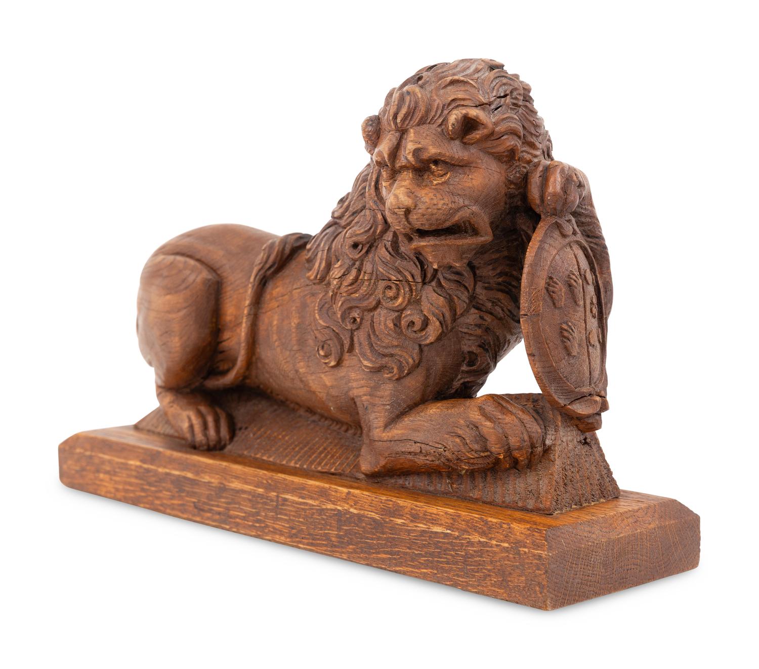 A Carved Oak Newel Post Figure of a Lion