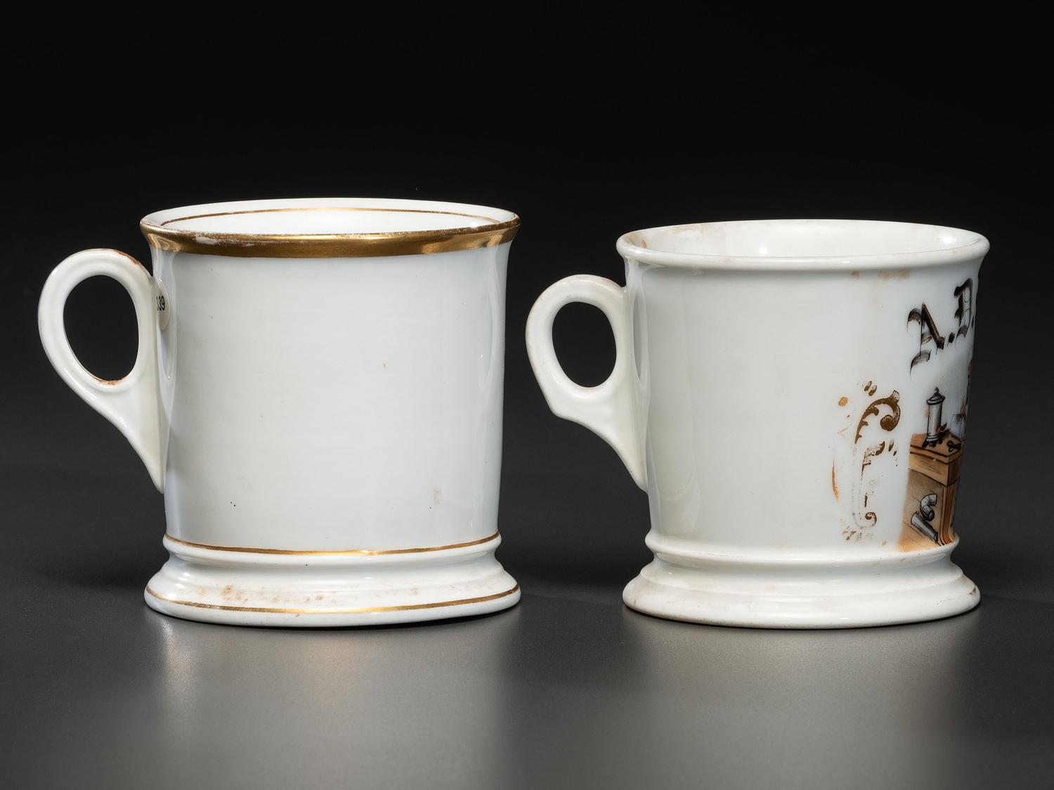 A Tinsmith and A Blacksmith's Porcelain Occupational Shaving Mugs