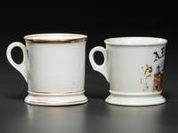 A Tinsmith and A Blacksmith's Porcelain Occupational Shaving Mugs