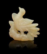 A Carved Agate Toggle Height 2 3/4 inches.