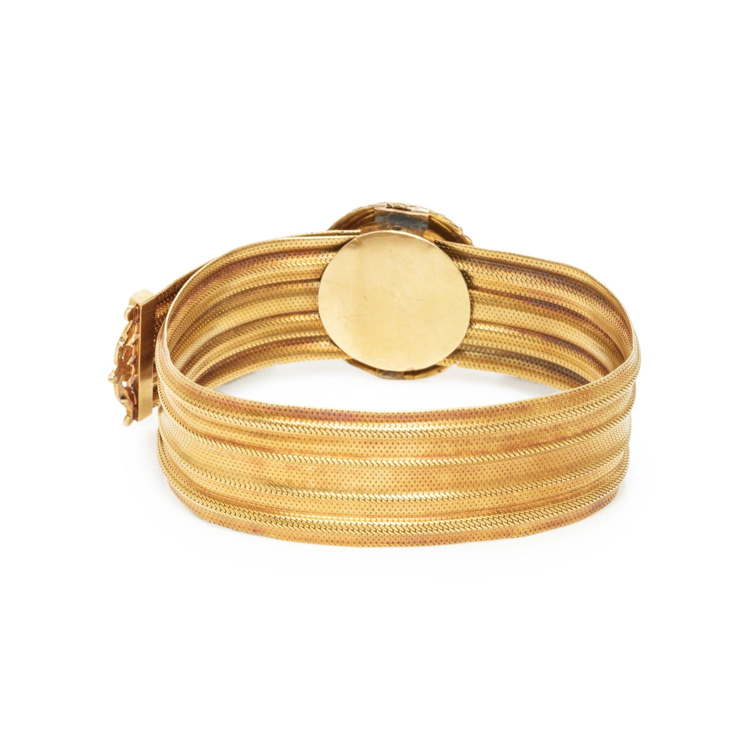 ETRUSCAN REVIVAL, YELLOW GOLD AND GARNET BRACELET