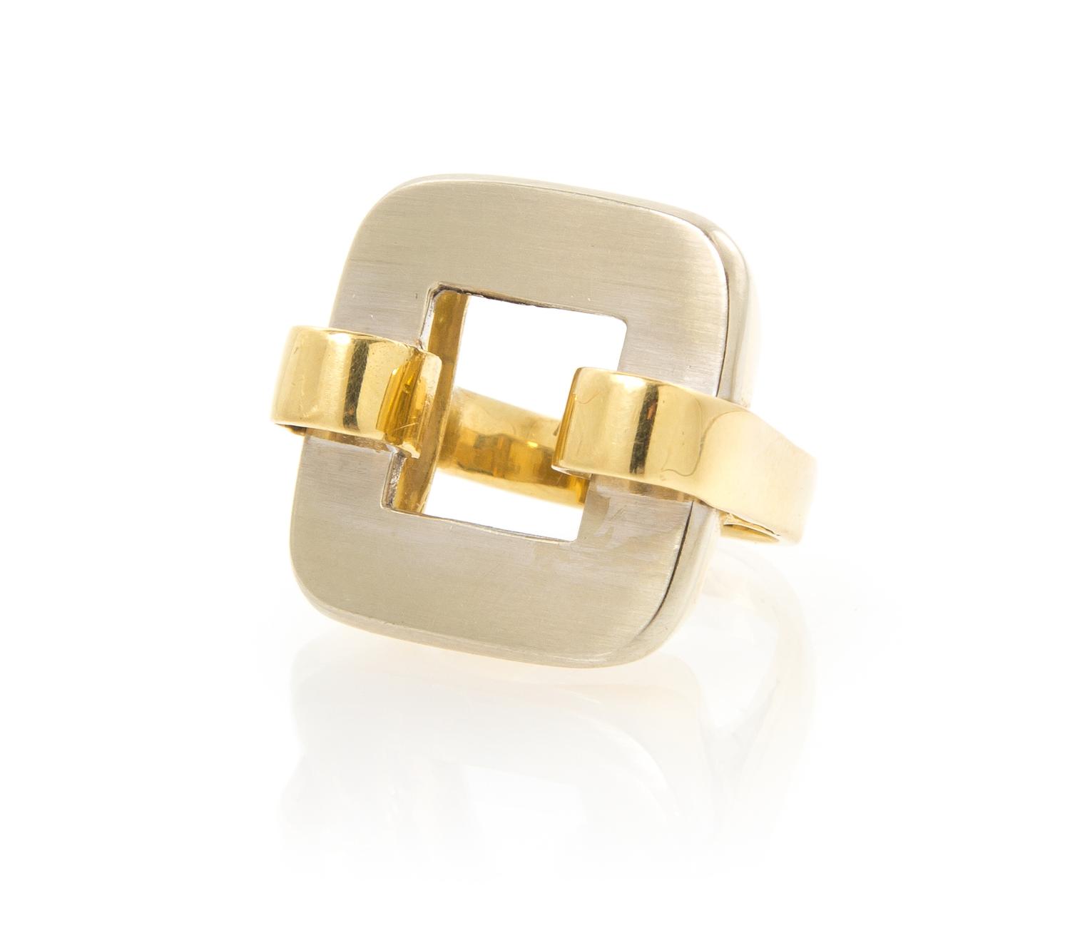 An 18 Karat Yellow and White Gold Ring, 7.50 dwts.