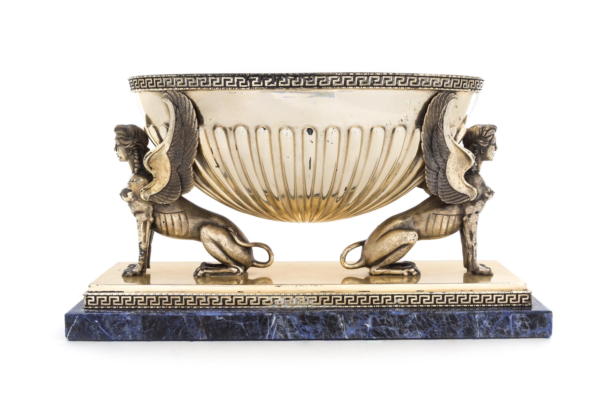 A Italian Neoclassical Silver and Lapis Lazuli Centerpiece Bowl, Johannes S.R.L., Milan, 20TH CENTURY, the reeded bowl of oval form wit