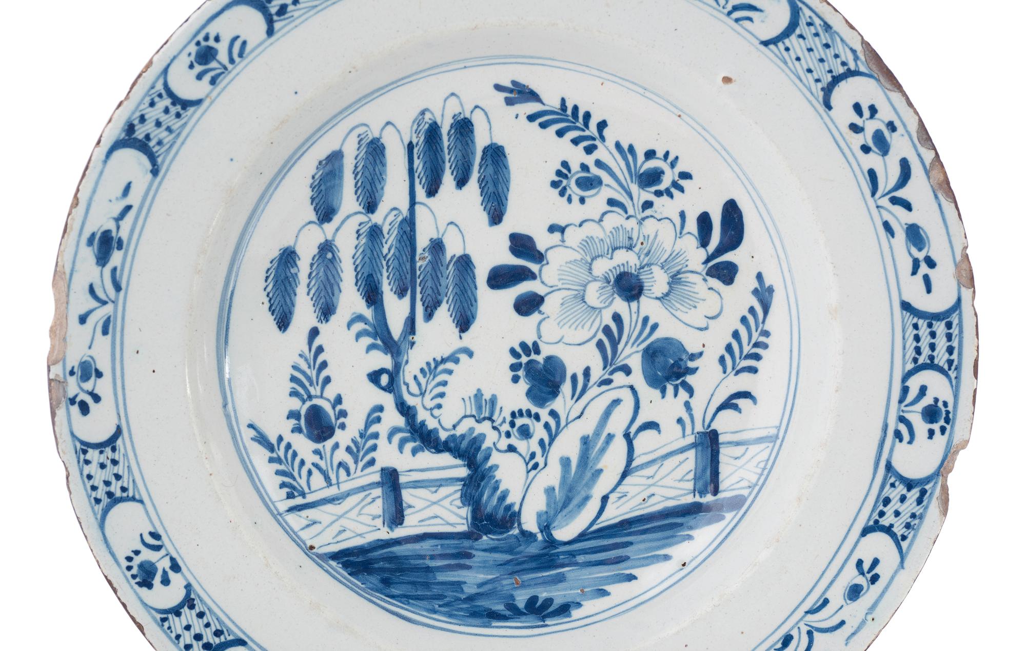 A Dutch Blue and White Glazed Delftware Charger