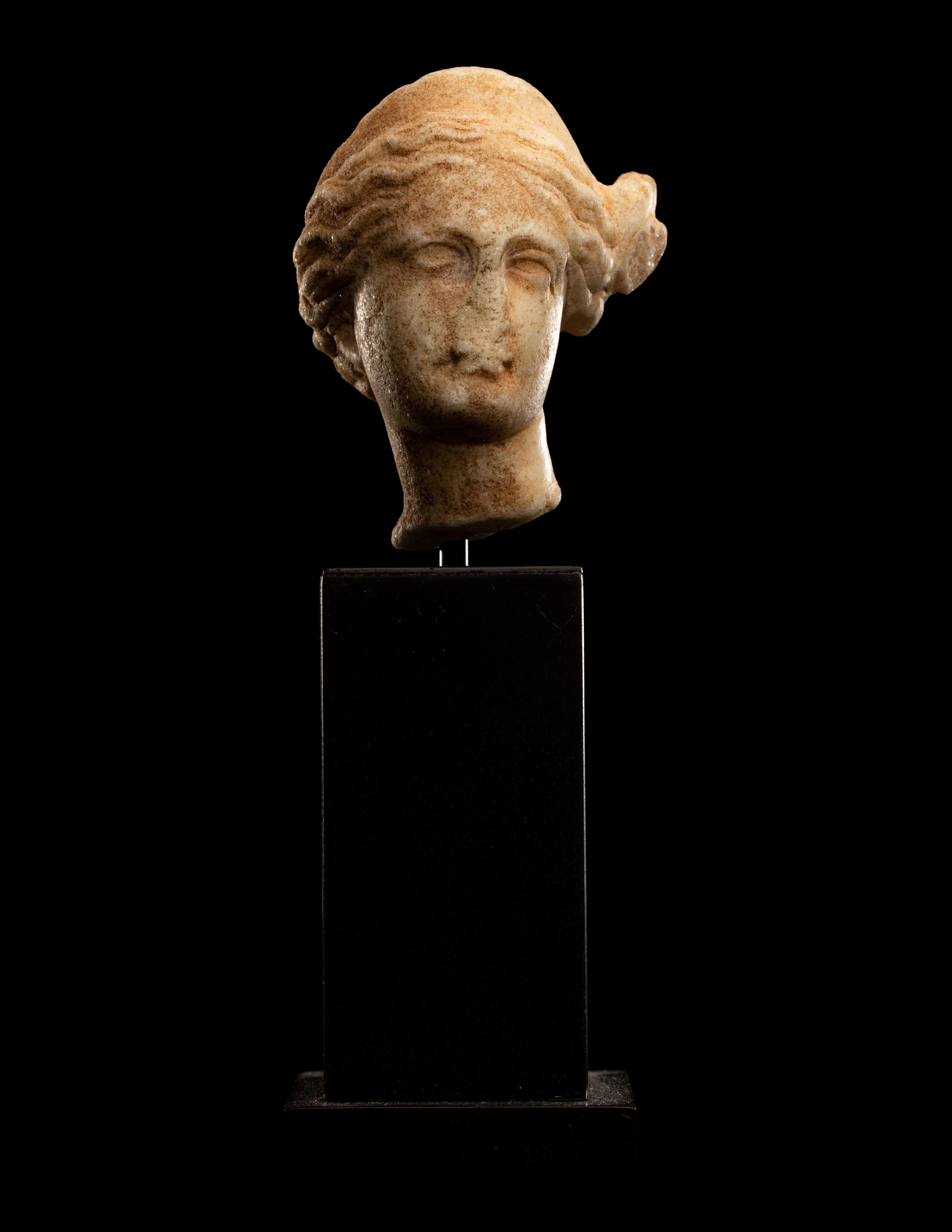 A Roman Marble Head of a Woman