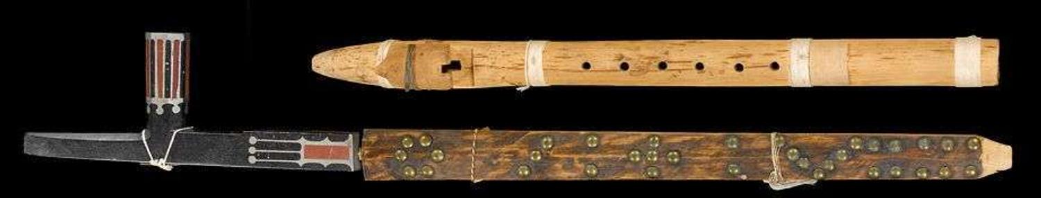 Inlaid Sioux black Catlinite pipe and carved wooden flute early 20th century