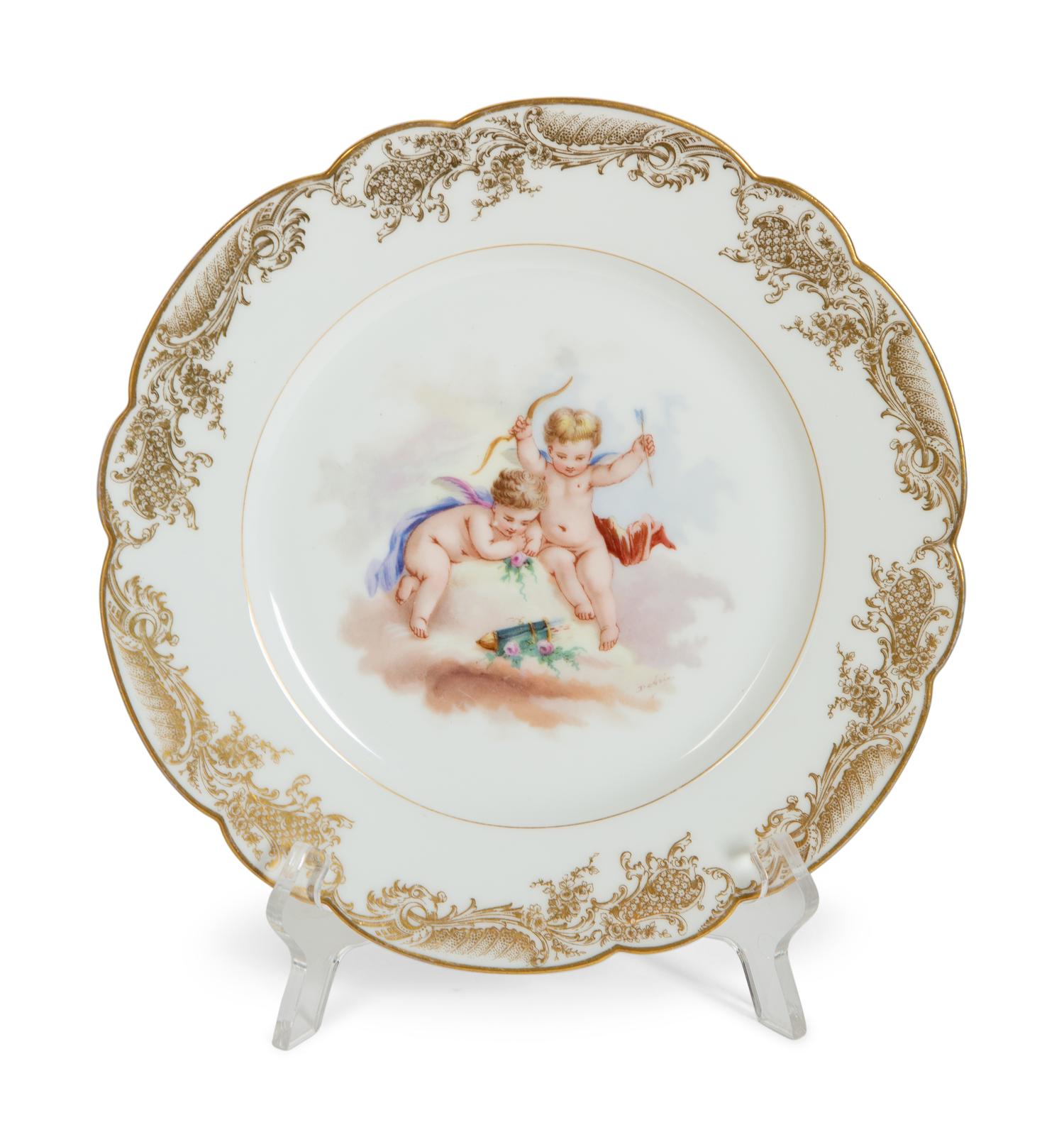 Three Sèvres Painted and Gilt Porcelain Cabinet Plates