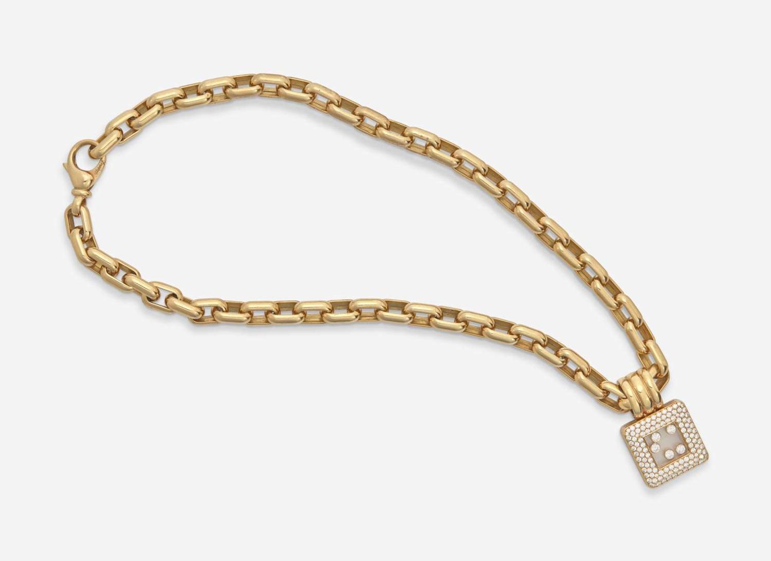An 18K Yellow Gold Chopard Happy Diamonds Necklace