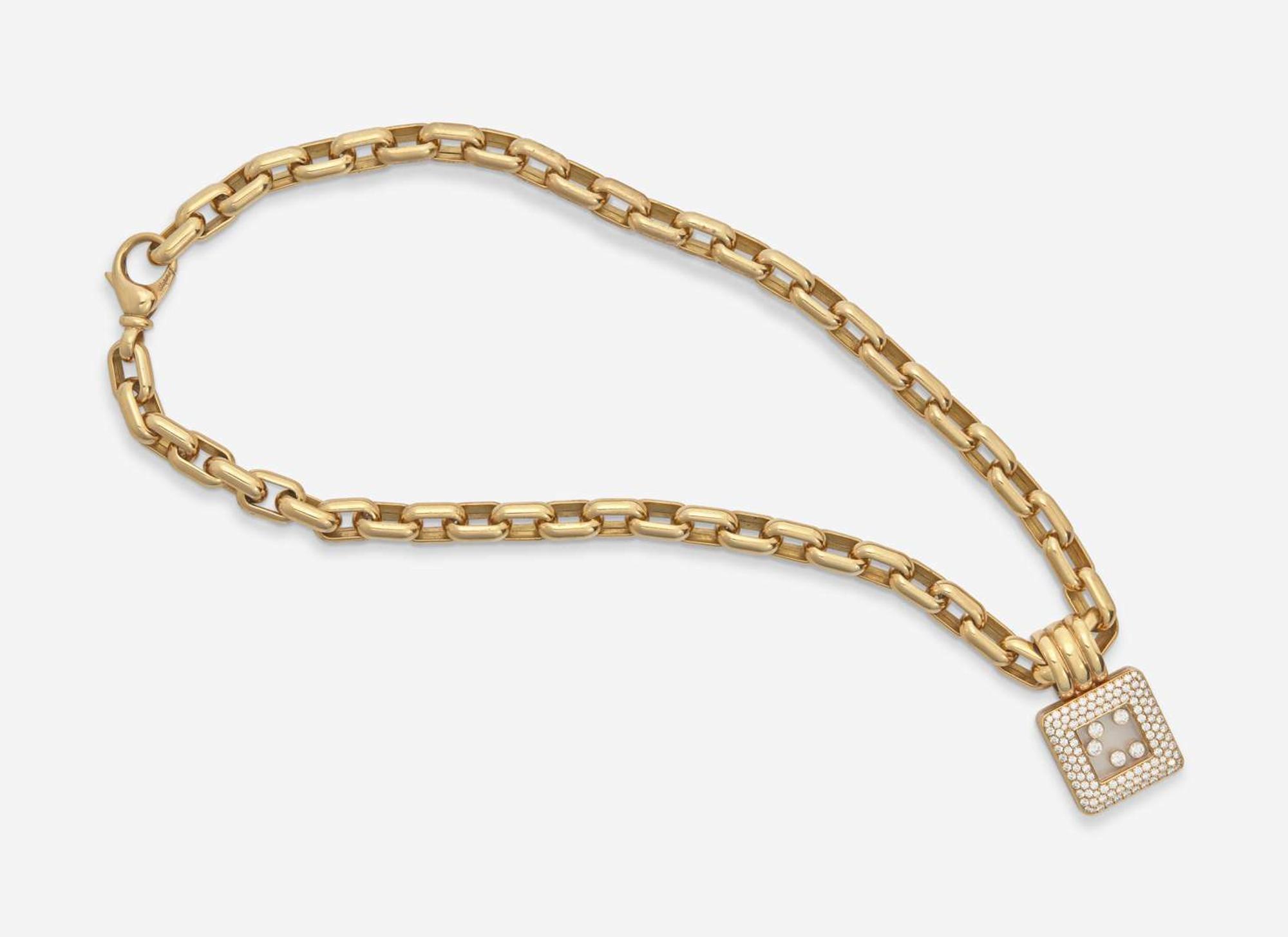An 18K Yellow Gold Chopard Happy Diamonds Necklace