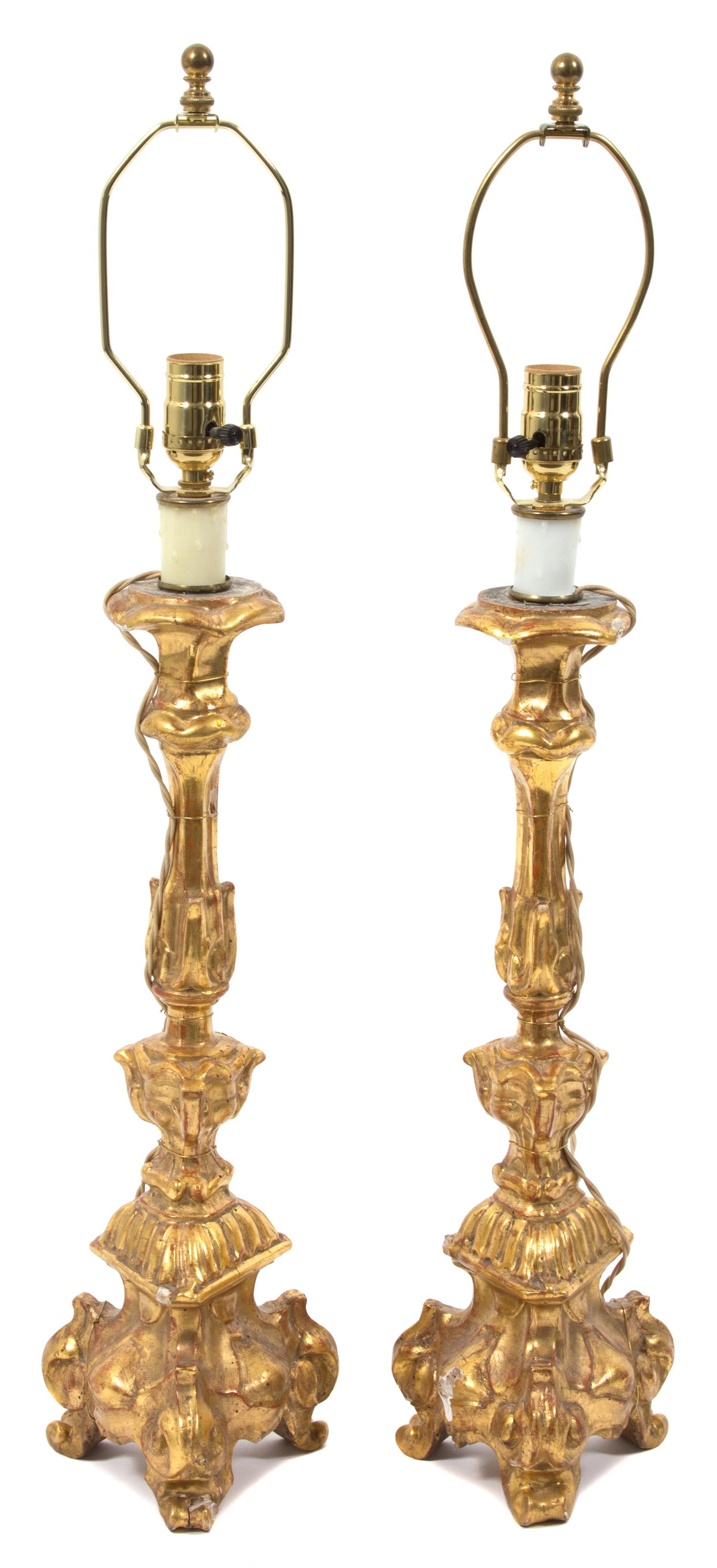 A Pair of Italian Giltwood Pricket Style Table Lamps Height 23 inches. — 20TH CENTURY