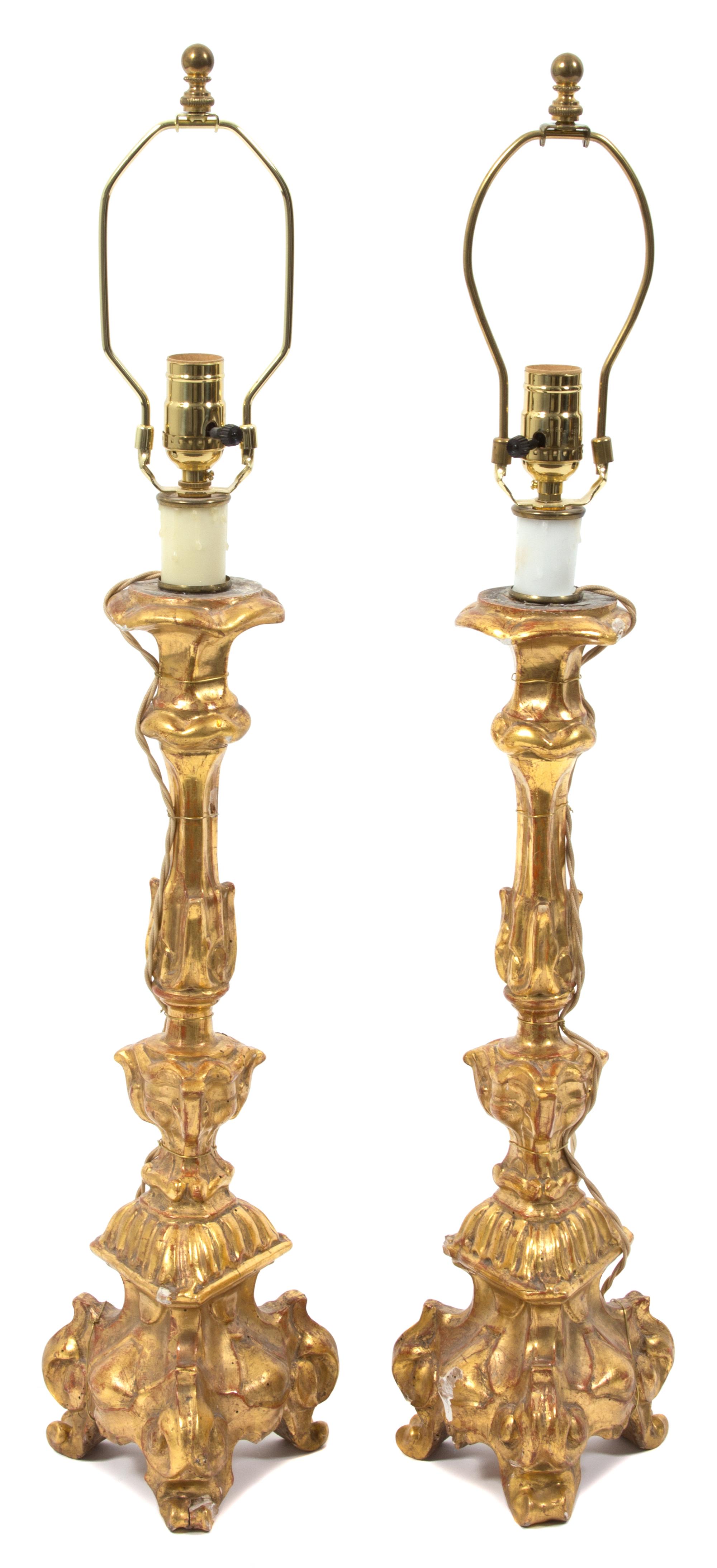 A Pair of Italian Giltwood Pricket Style Table Lamps Height 23 inches. — 20TH CENTURY