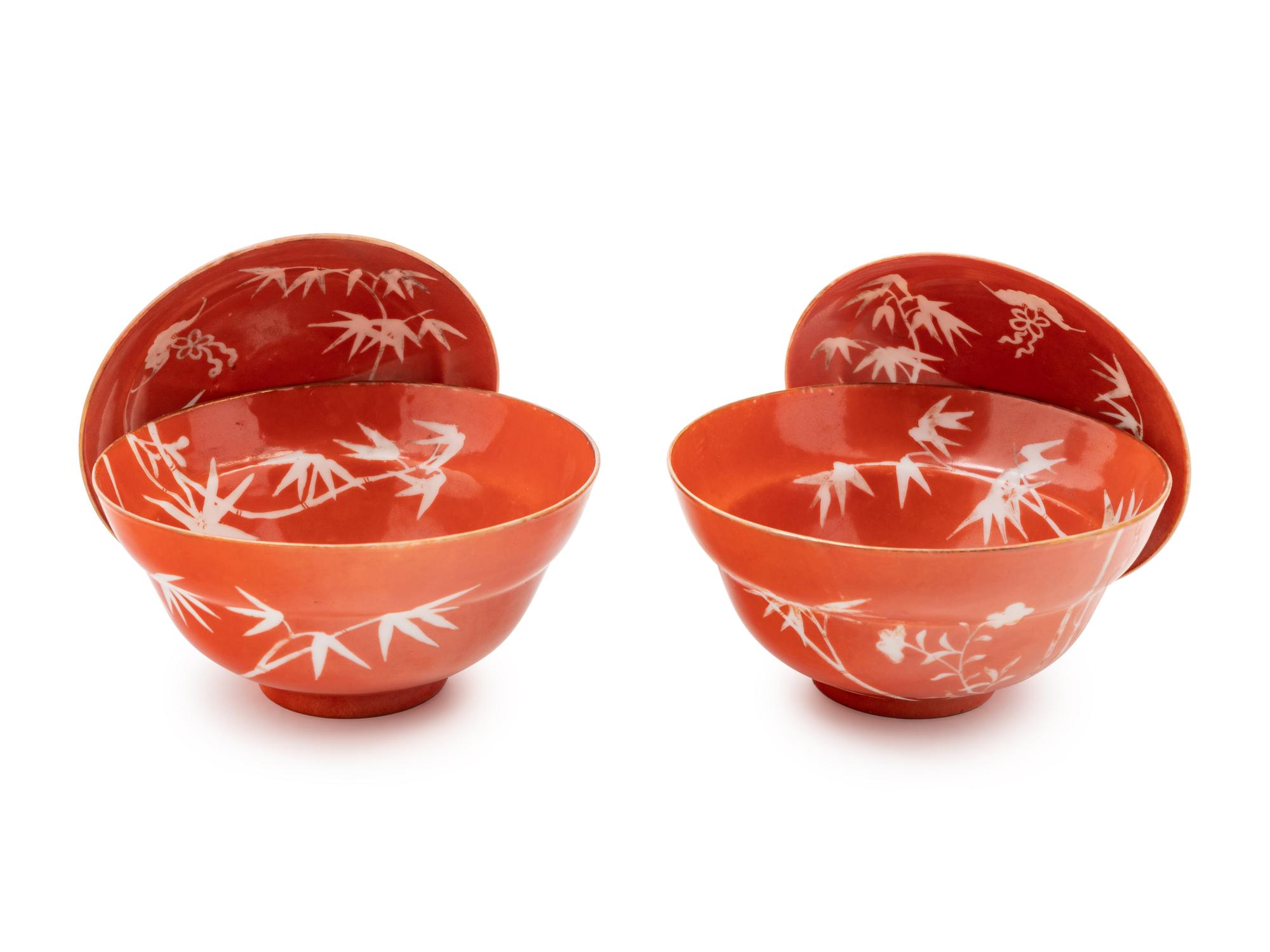 A Pair of Chinese Coral Red Ground Porcelain 'Bamboo' Covered Bowls