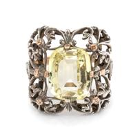 An 18 Karat Yellow Gold, Silver and Yellow Sapphire Ring,