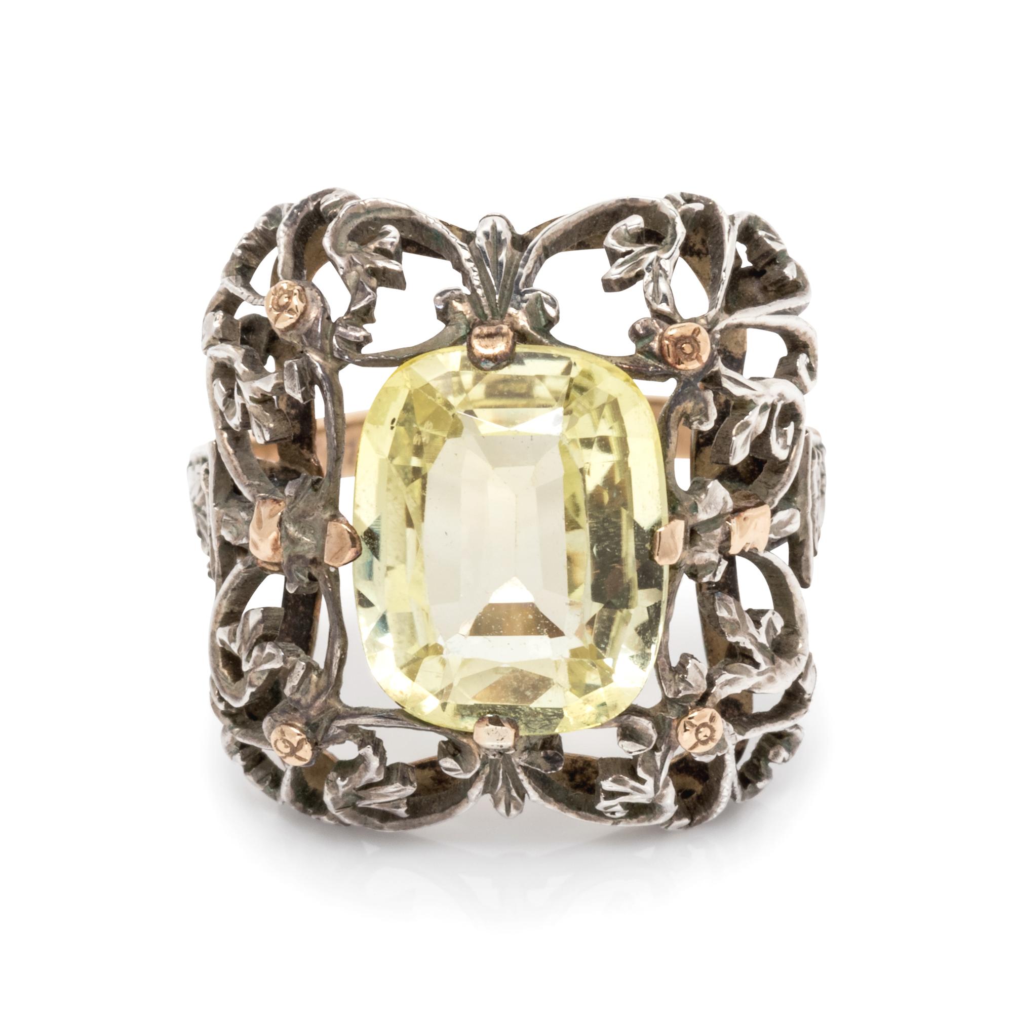 An 18 Karat Yellow Gold, Silver and Yellow Sapphire Ring,