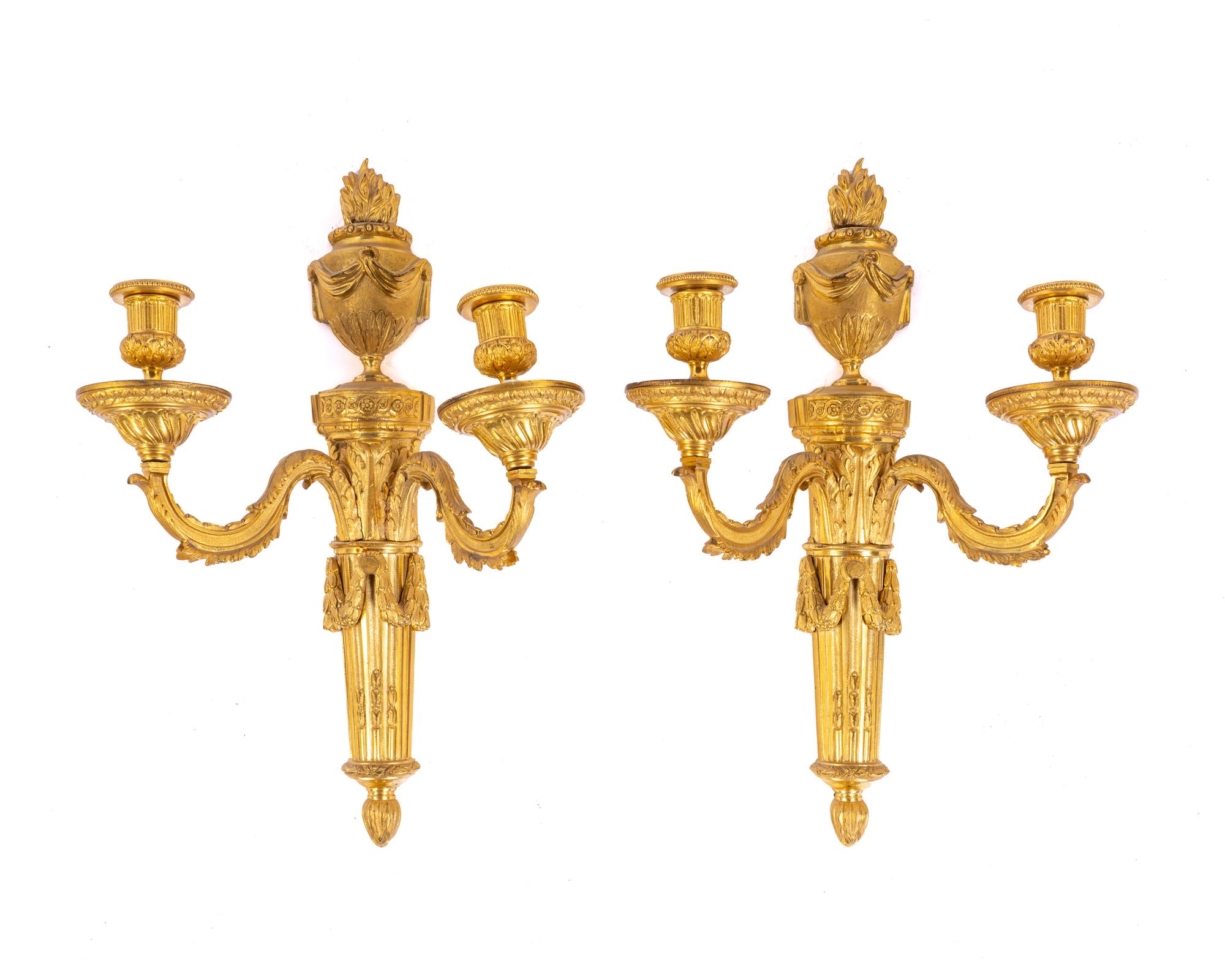 A Pair of Louis XVI Gilt Bronze Two-Light Sconces