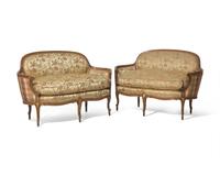 A Pair of Louis XVI Style Upholstered Canapés
