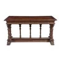 An Italian Carved Walnut Library Table