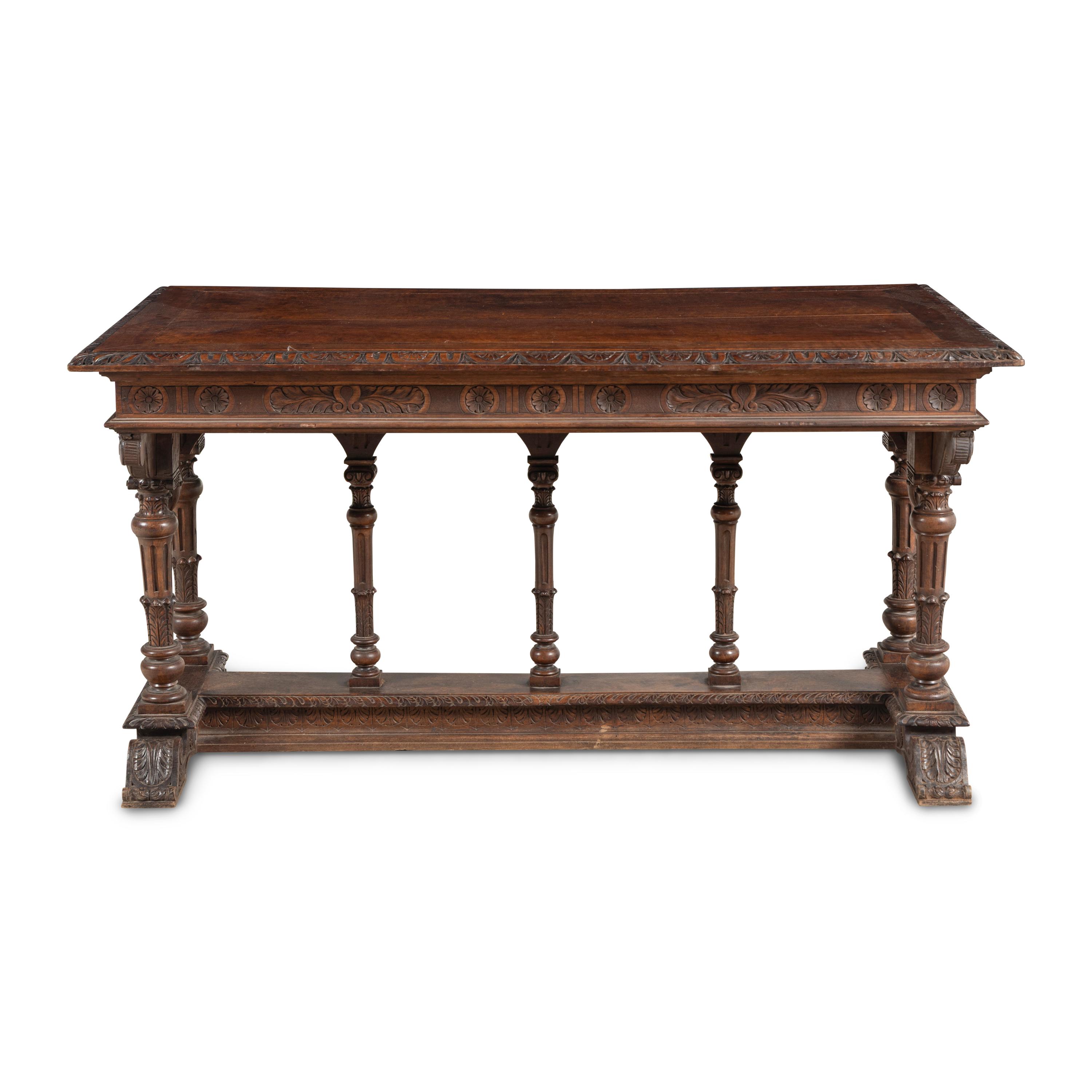 An Italian Carved Walnut Library Table