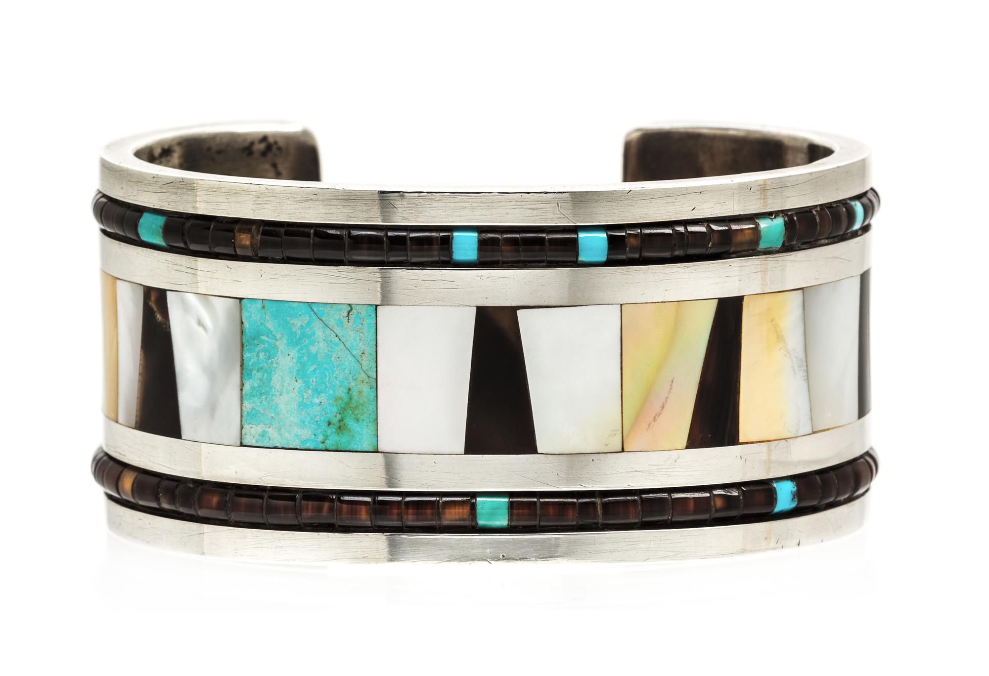 A Silver, Mother-of-Pearl, Tortoise Shell and Turquoise Cuff Bracelet, 65.10 dwts.
