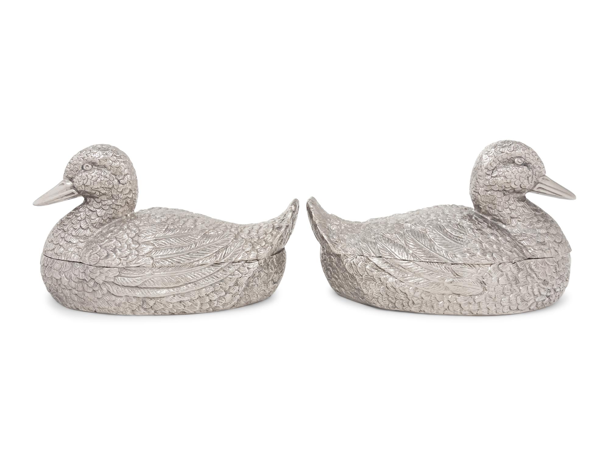 A Pair of Silvered Metal Duck-Form Boxes