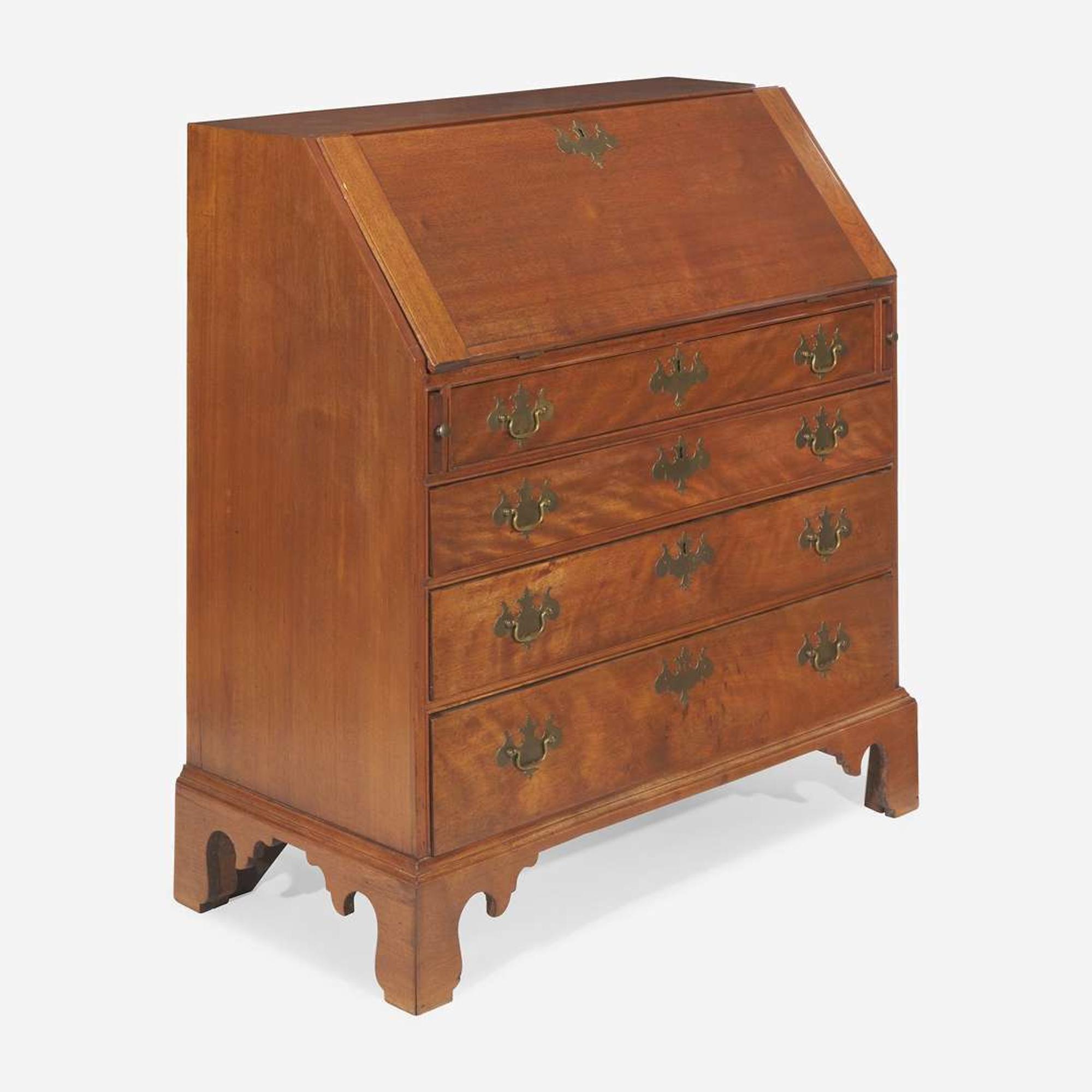 A Chippendale carved and figured walnut slant-front desk New England, late 18th century